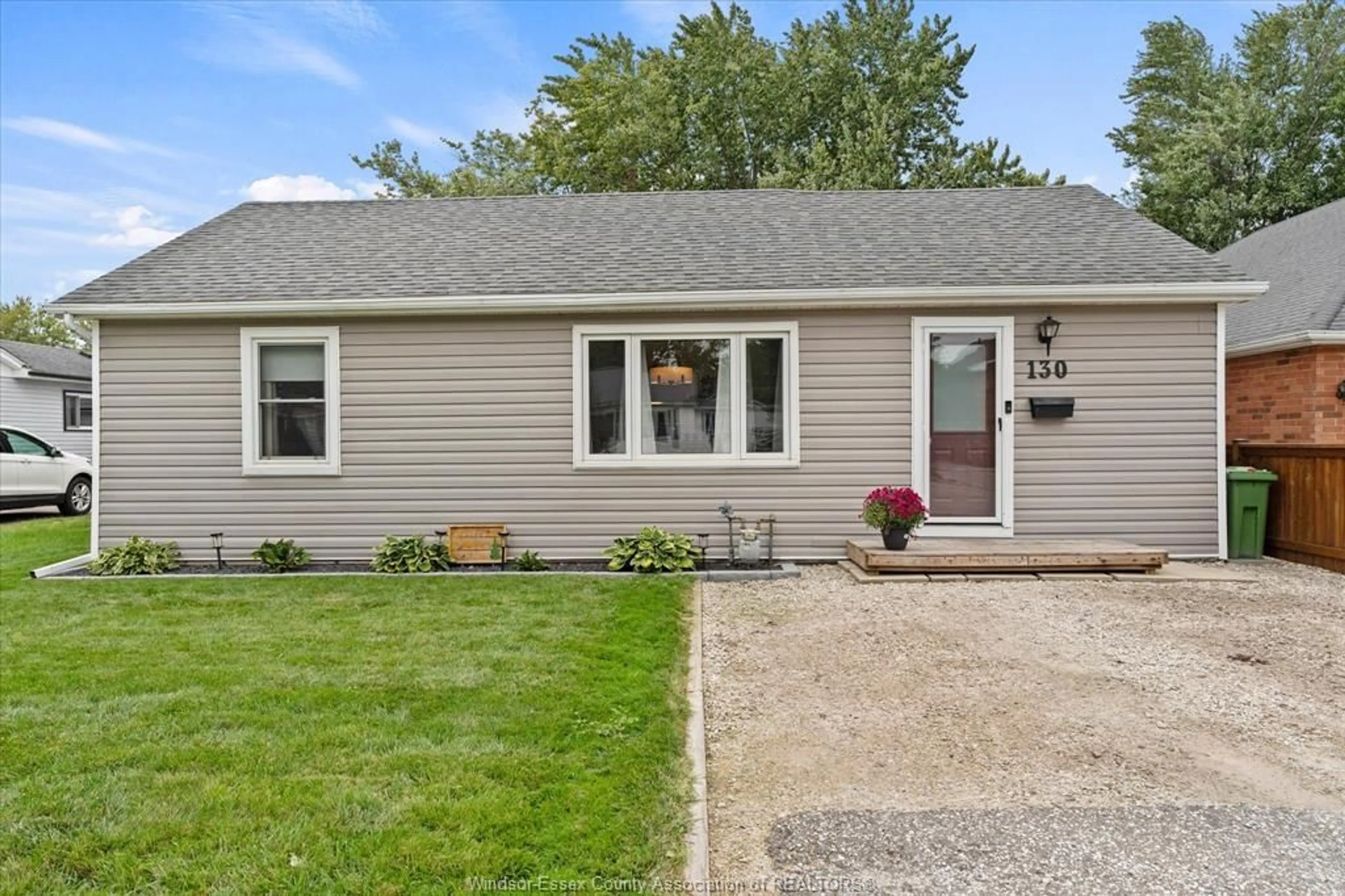 Home with vinyl exterior material, street for 130 Langtry St, Essex Ontario N8M 1H2