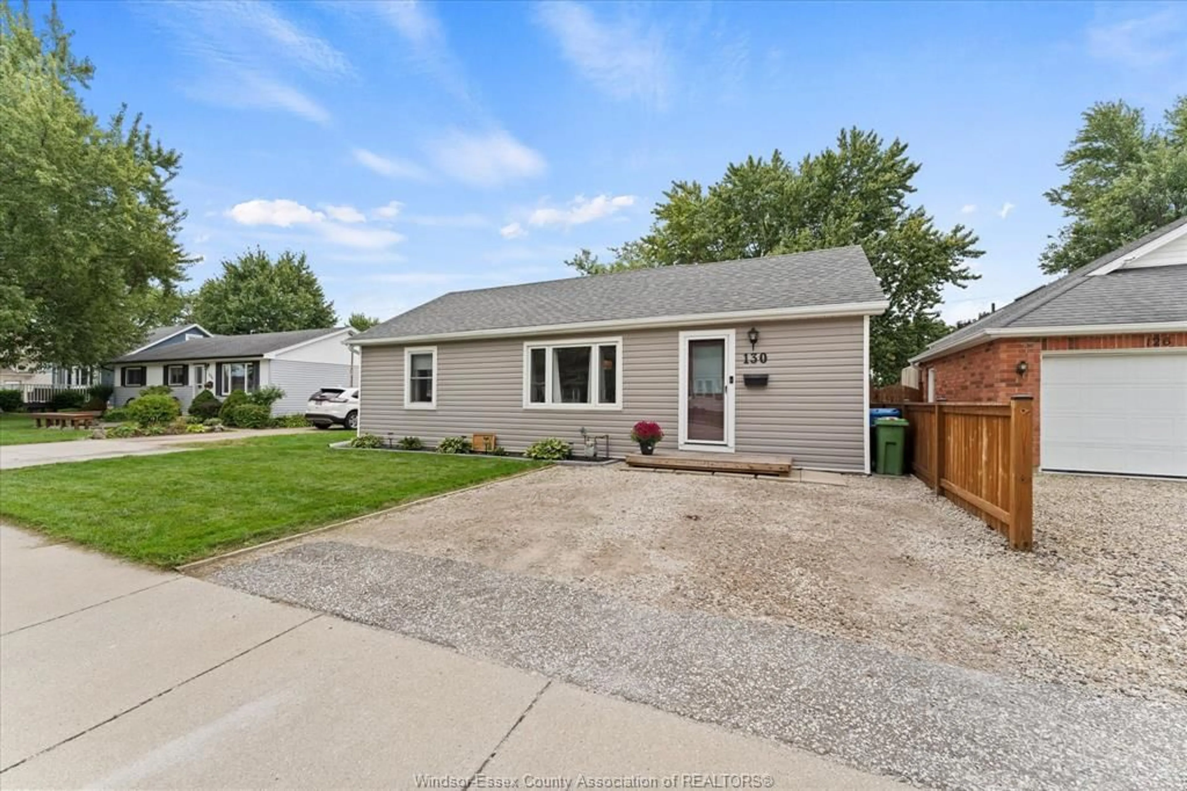 Home with vinyl exterior material, street for 130 Langtry St, Essex Ontario N8M 1H2