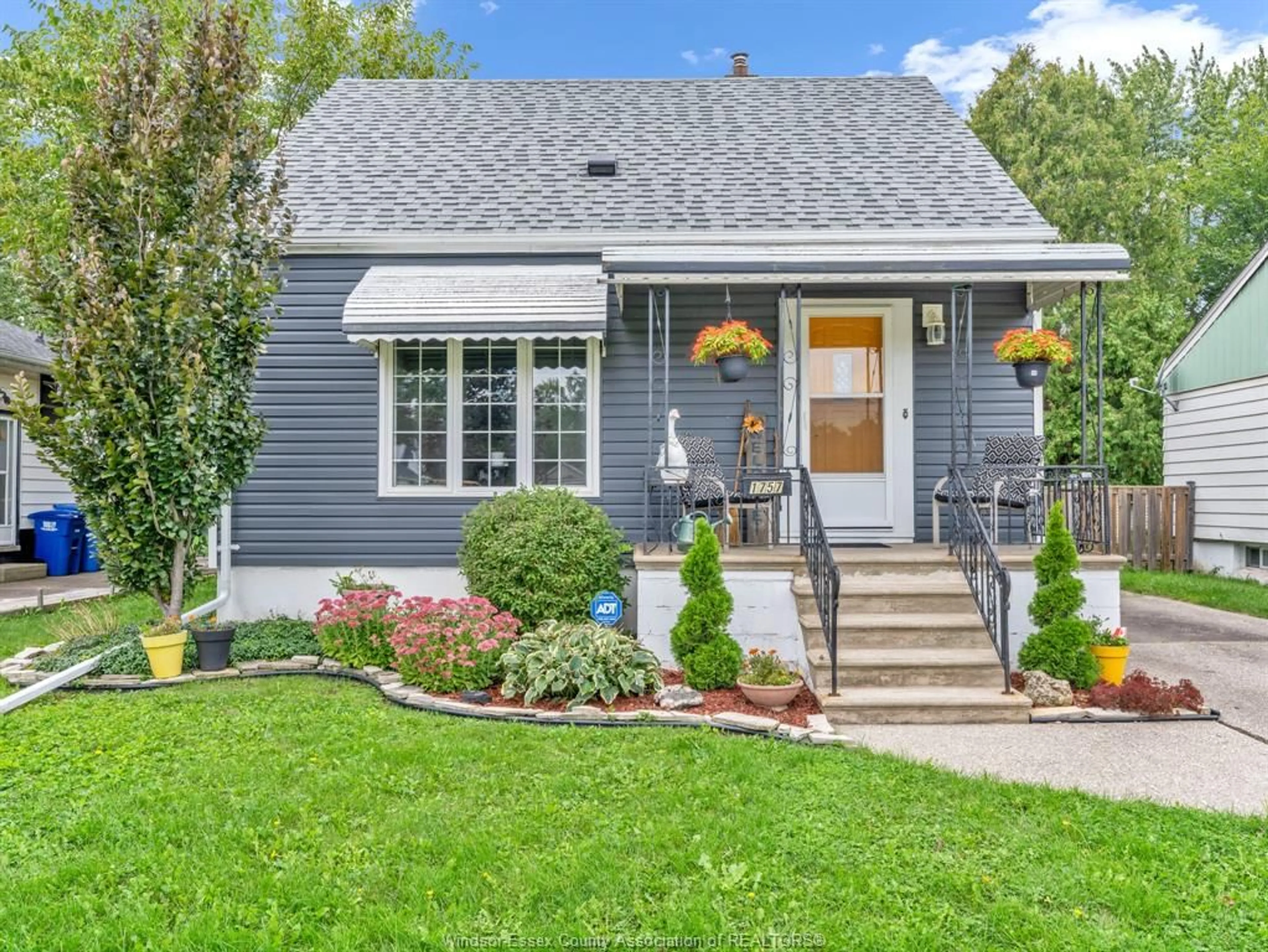 Home with vinyl exterior material, street for 1757 OLIVE Rd, Windsor Ontario N8Y 4M9