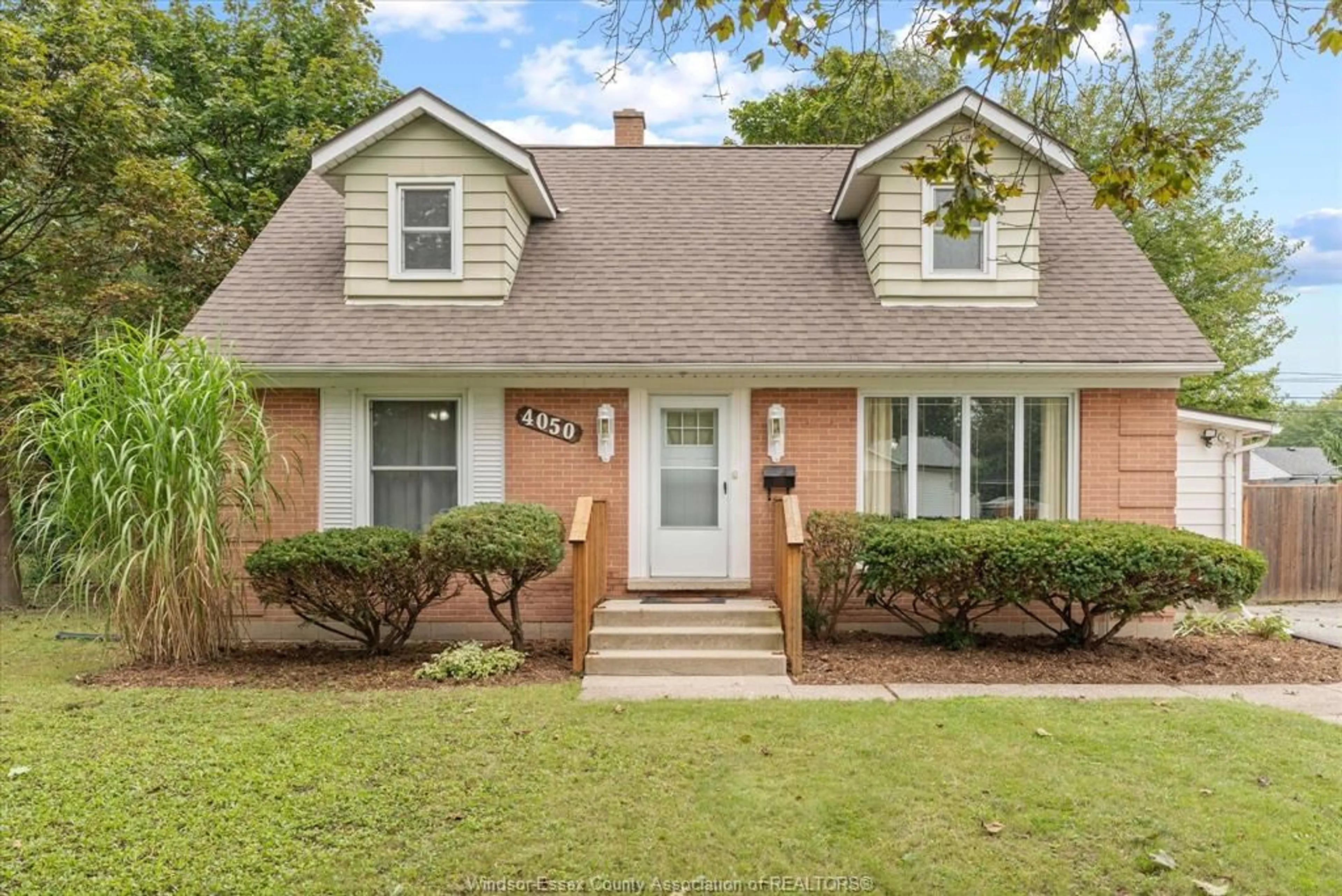 Home with brick exterior material, street for 4050 EDEN Dr, Windsor Ontario N9G 2E8