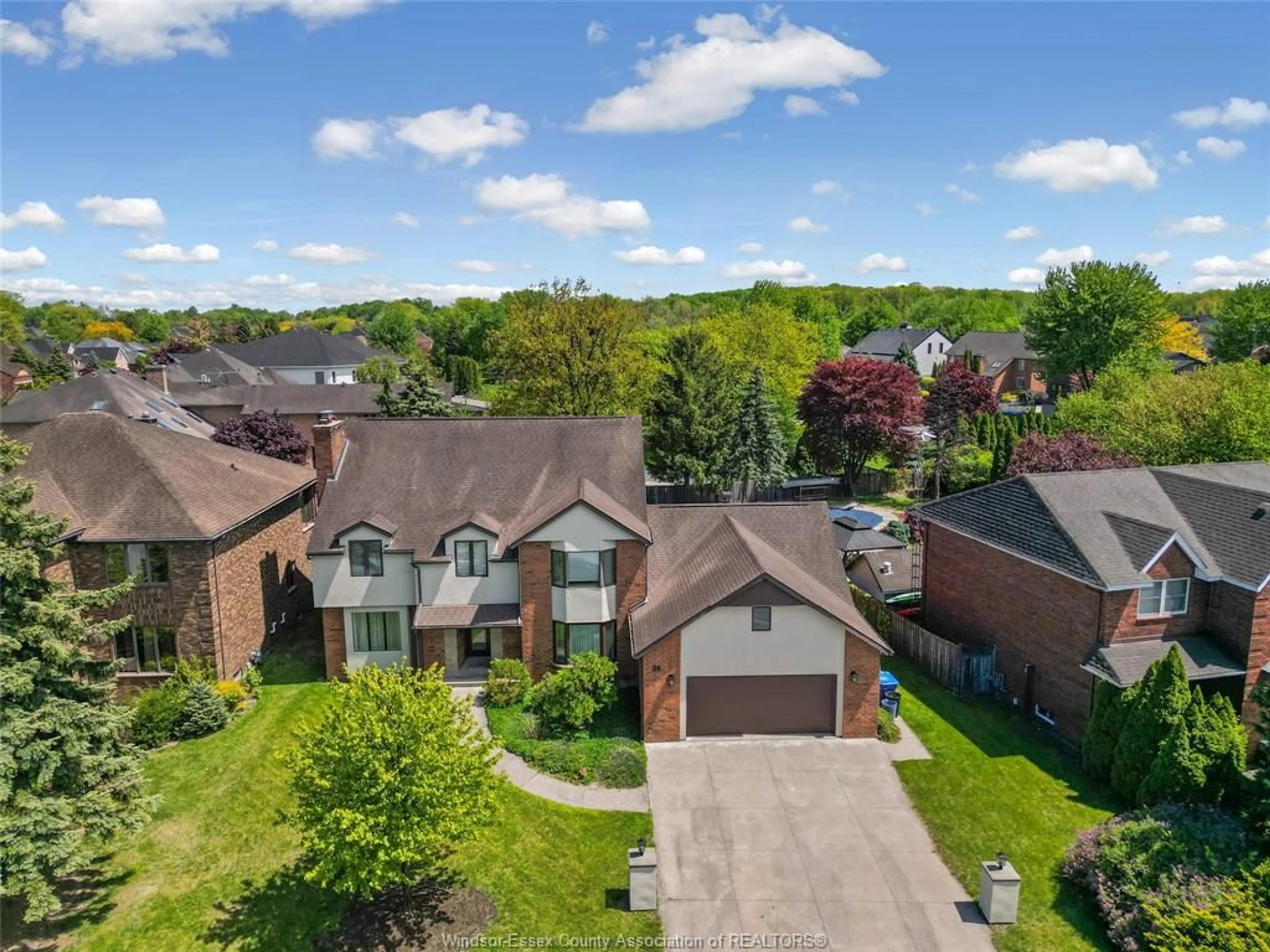 A pic from outside/outdoor area/front of a property/back of a property/a pic from drone, street for 28 CLEOPHAS Dr, Lakeshore Ontario N8N 4J9
