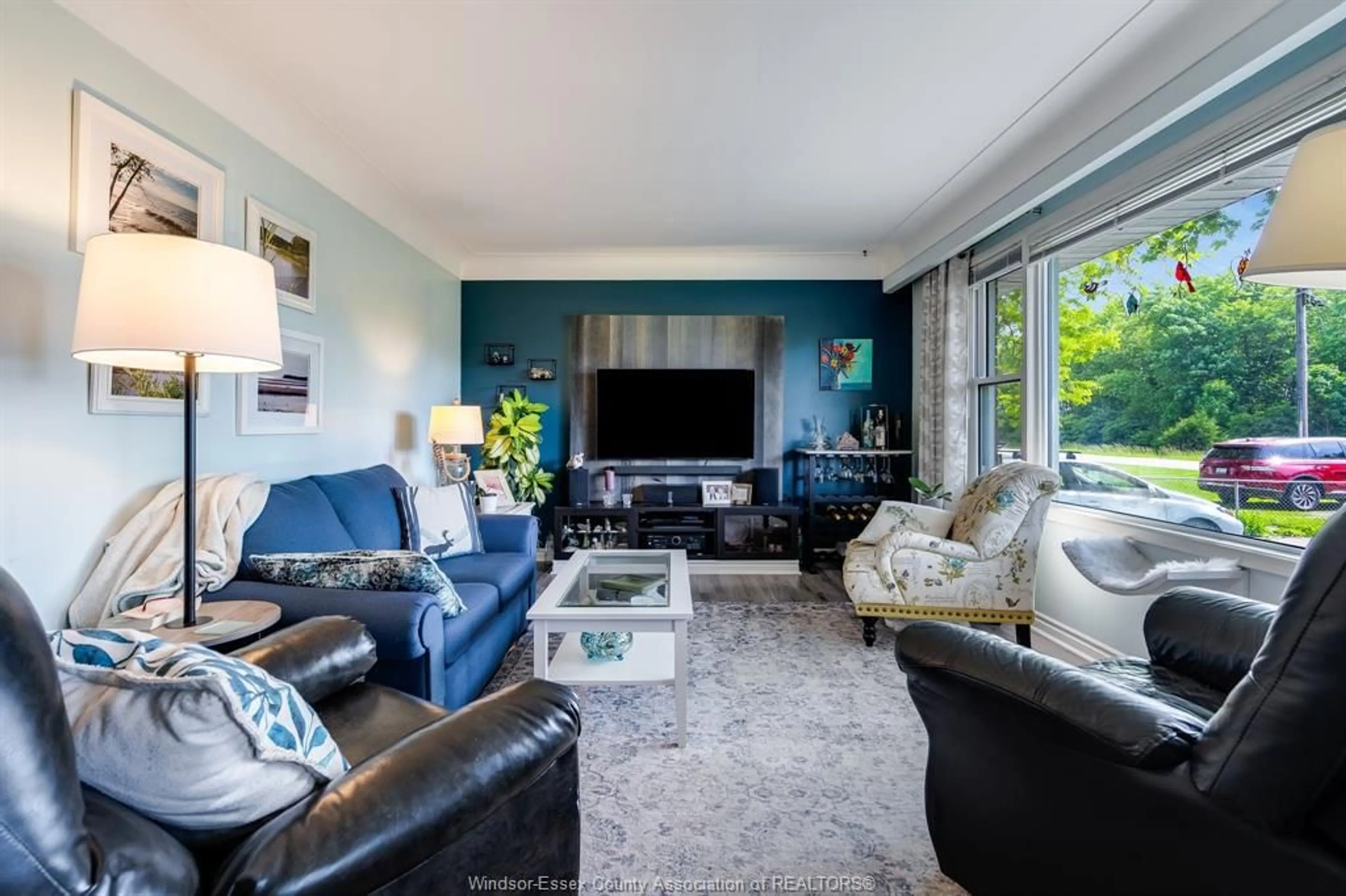 Living room with furniture, unknown for 27 Mersea Rd 12, Leamington Ontario N8H 3V4