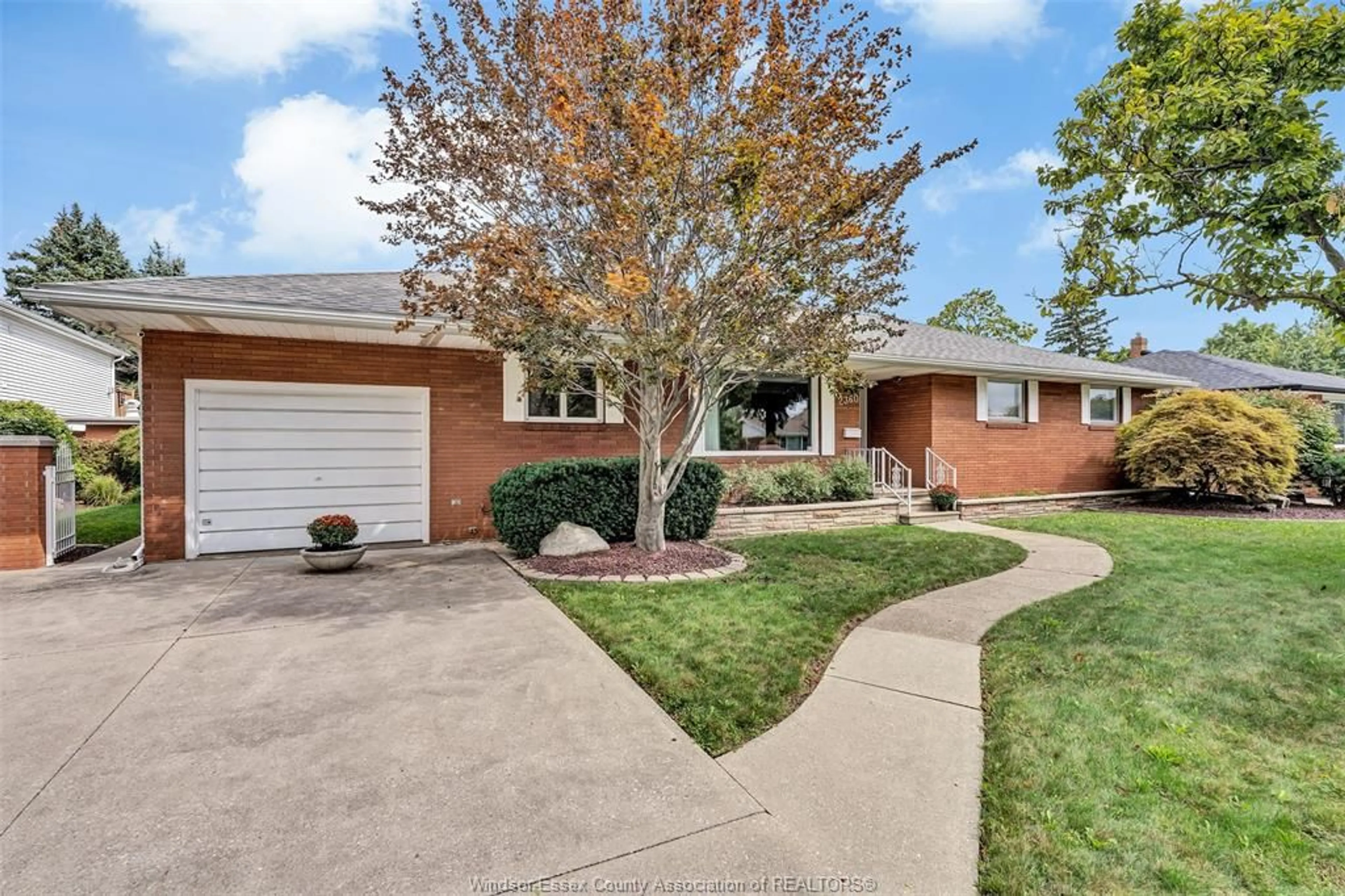 Home with brick exterior material, street for 2360 LEONARD Rd, Windsor Ontario N8W 4L7
