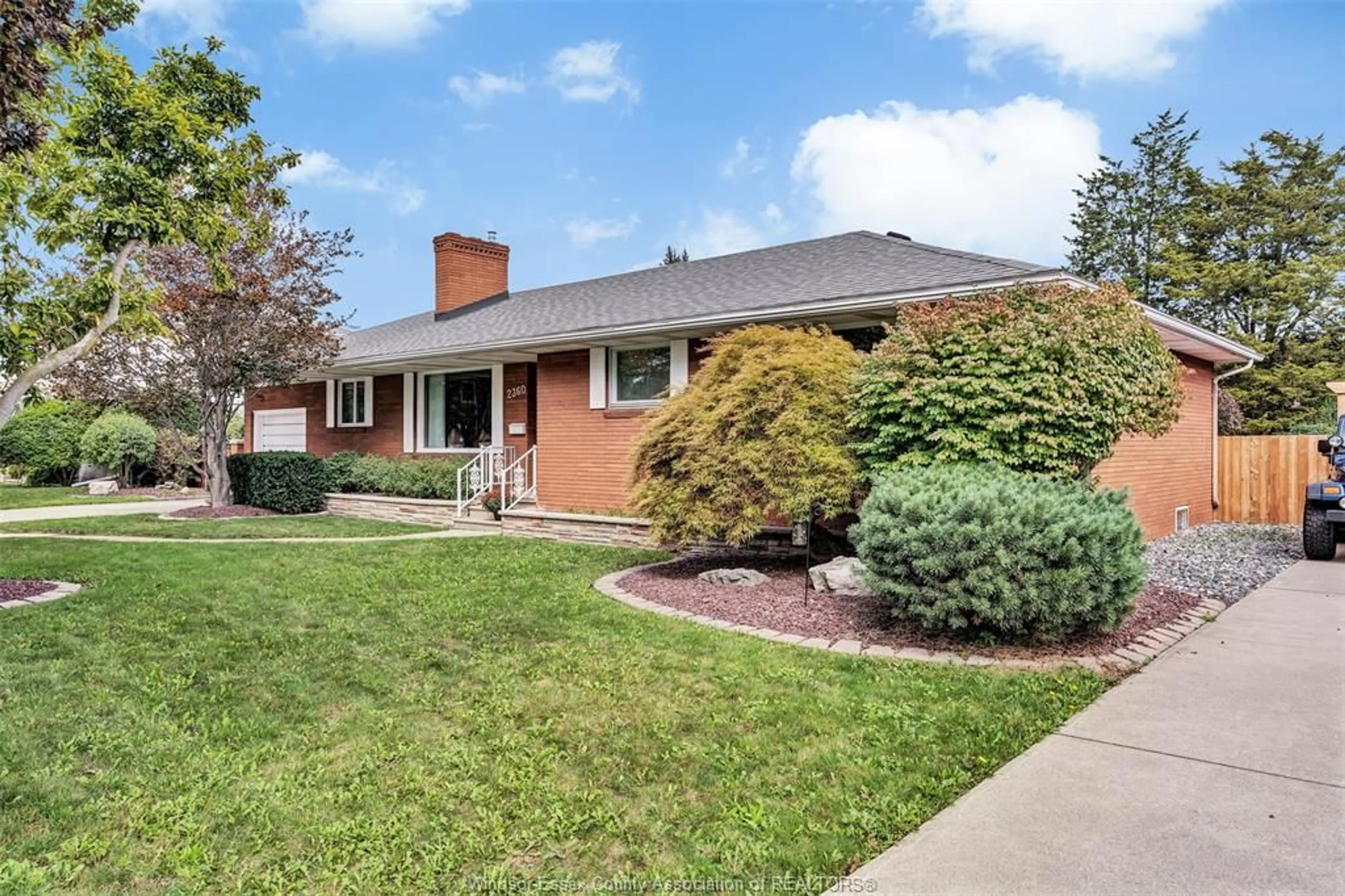 Home with brick exterior material, street for 2360 LEONARD Rd, Windsor Ontario N8W 4L7