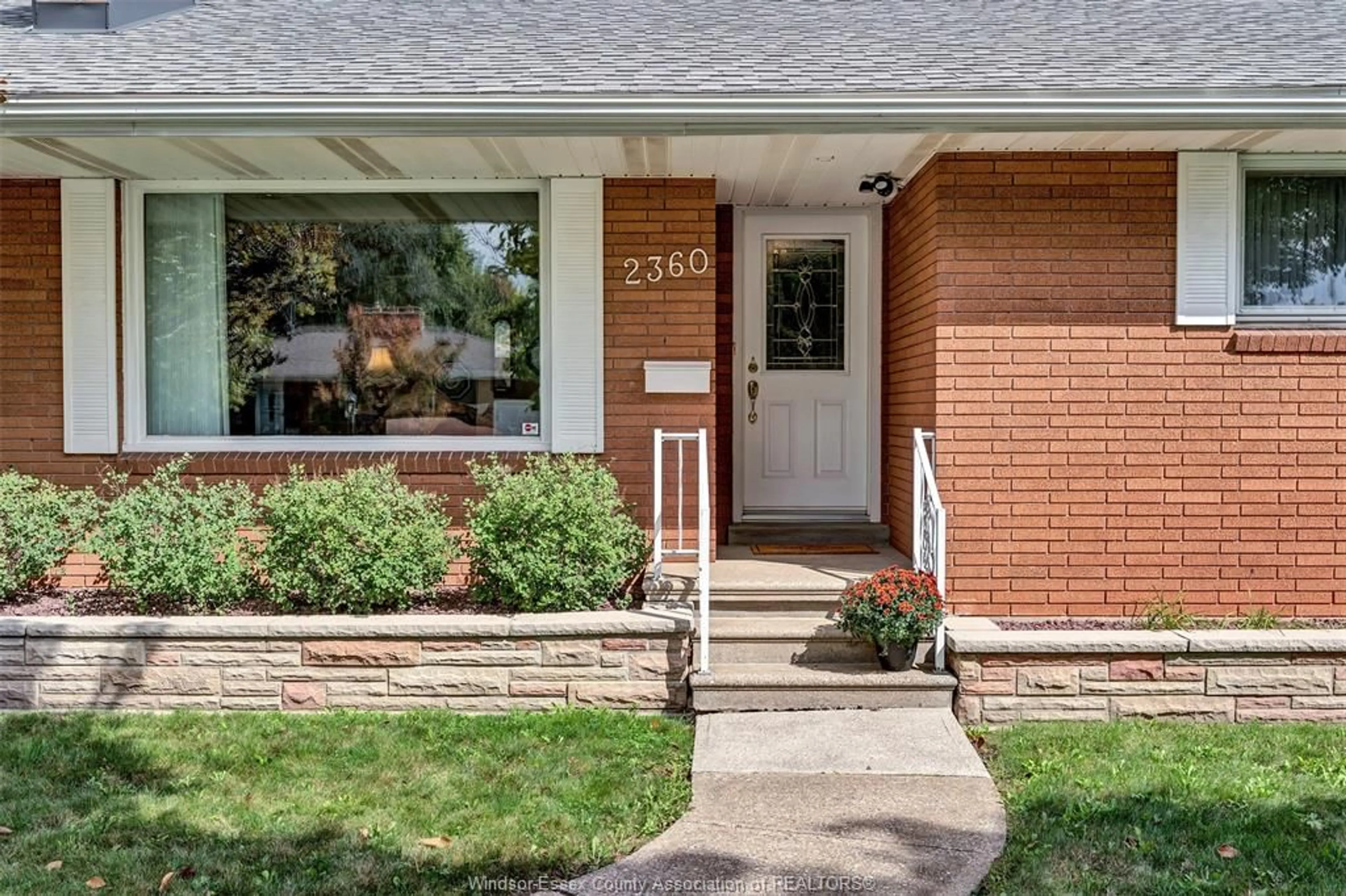Home with brick exterior material, street for 2360 LEONARD Rd, Windsor Ontario N8W 4L7