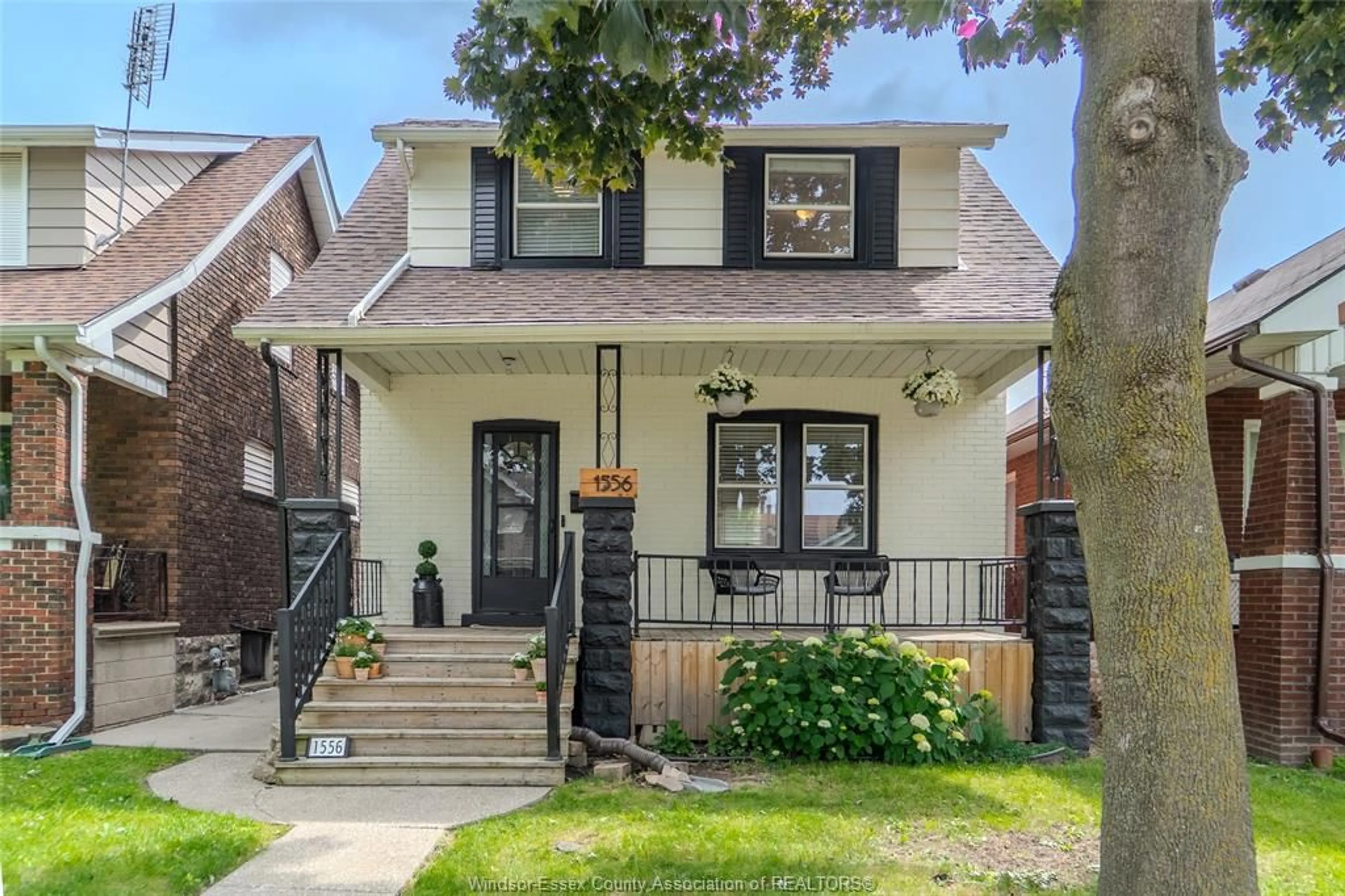 Home with brick exterior material, street for 1556 Hall Ave, Windsor Ontario N8X 4R7