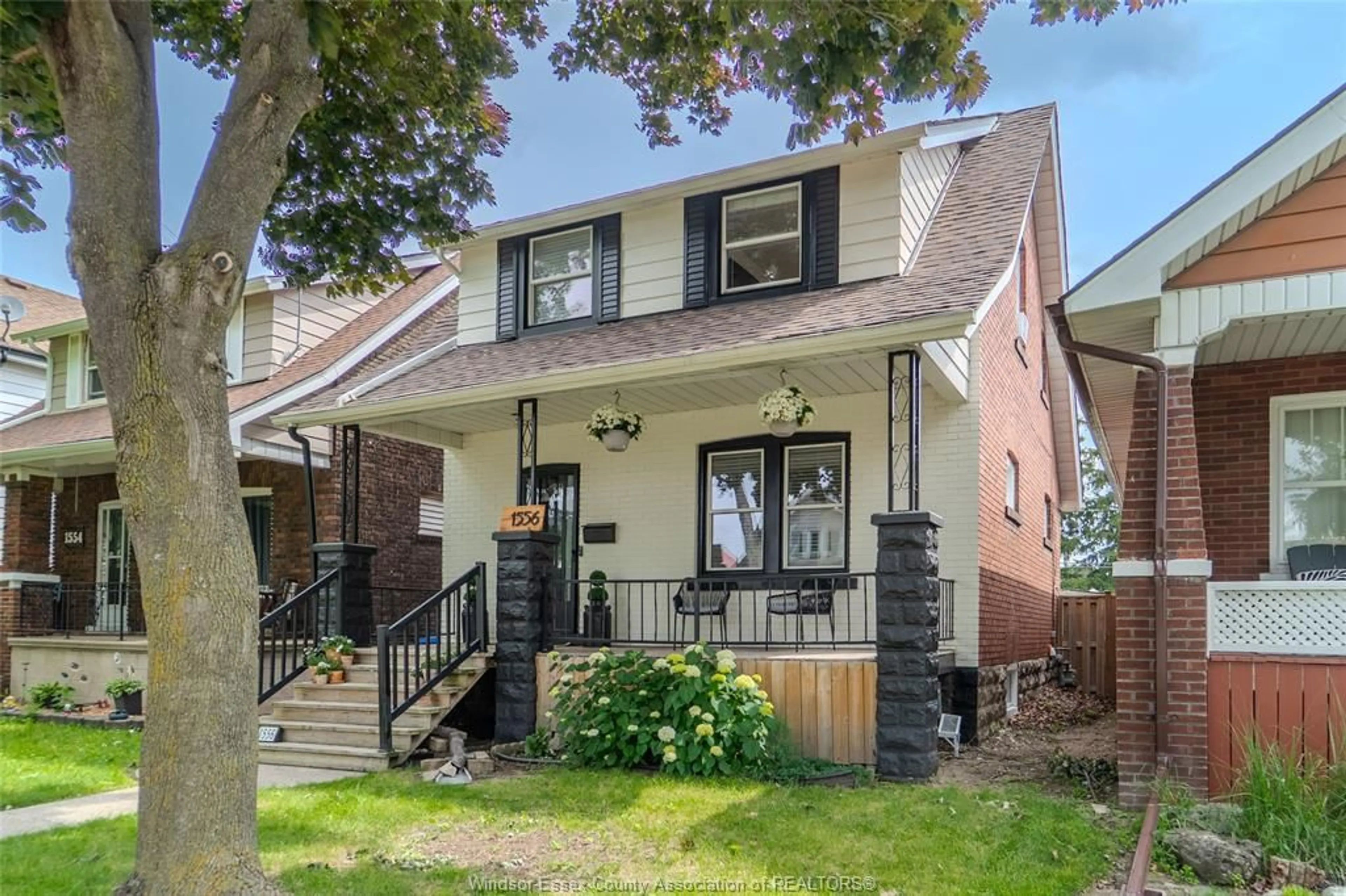 Home with brick exterior material, street for 1556 Hall Ave, Windsor Ontario N8X 4R7