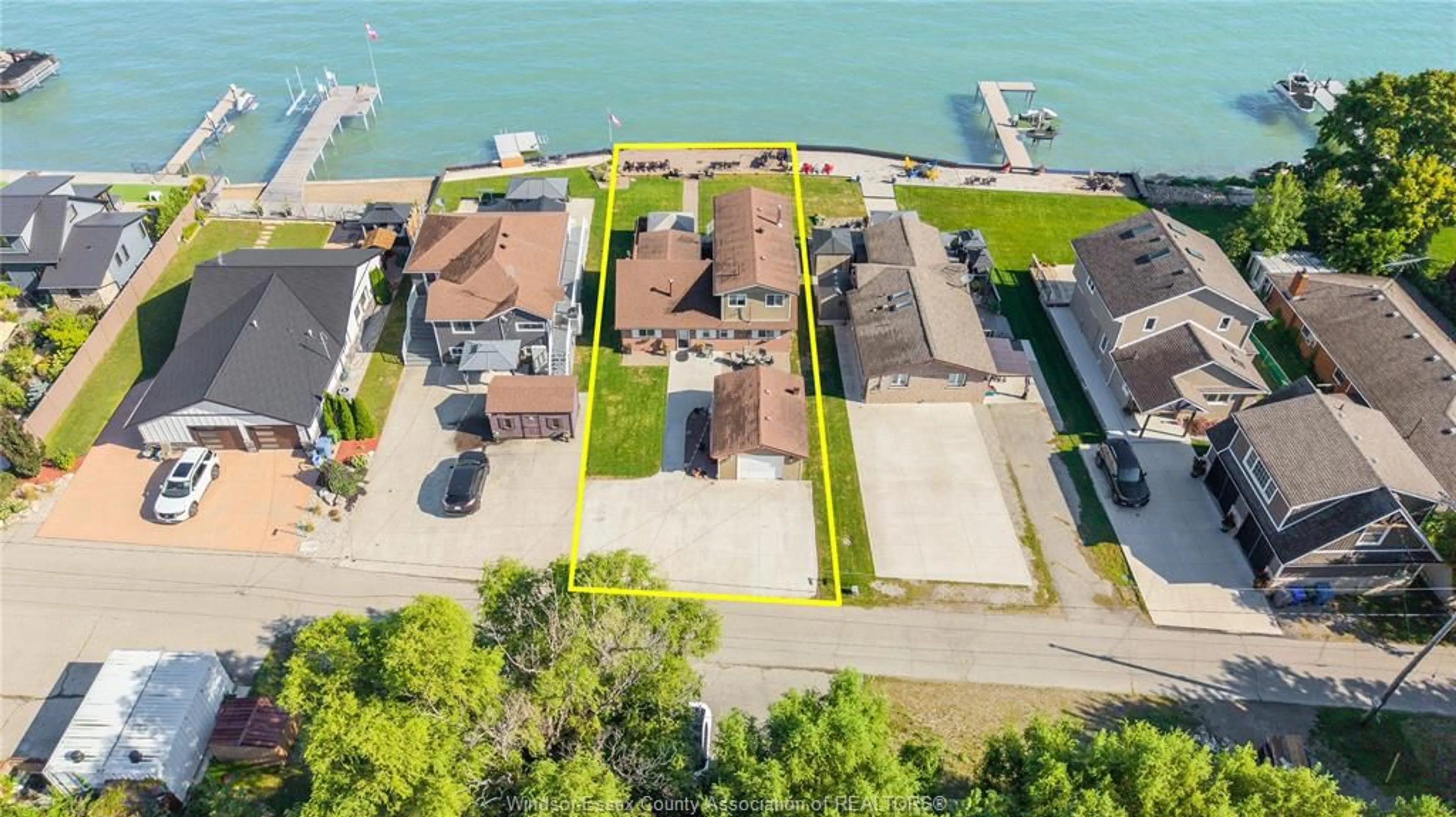 A pic from outside/outdoor area/front of a property/back of a property/a pic from drone, water/lake/river/ocean view for 1328 SHORELINE Ave, Lakeshore Ontario N0R 1A0