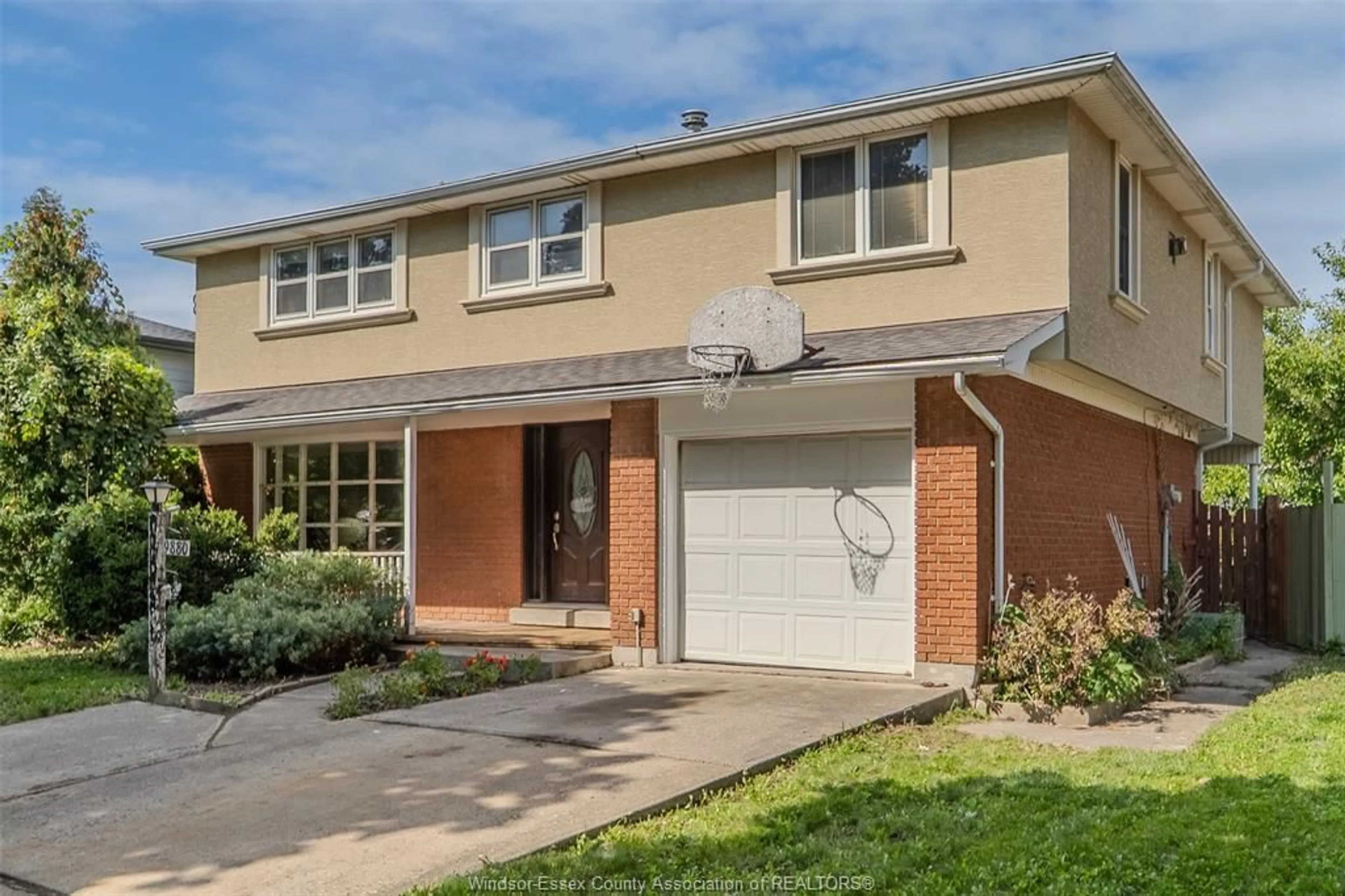 Home with brick exterior material, street for 9880 ASGARD Rd, Windsor Ontario N8R 1E2
