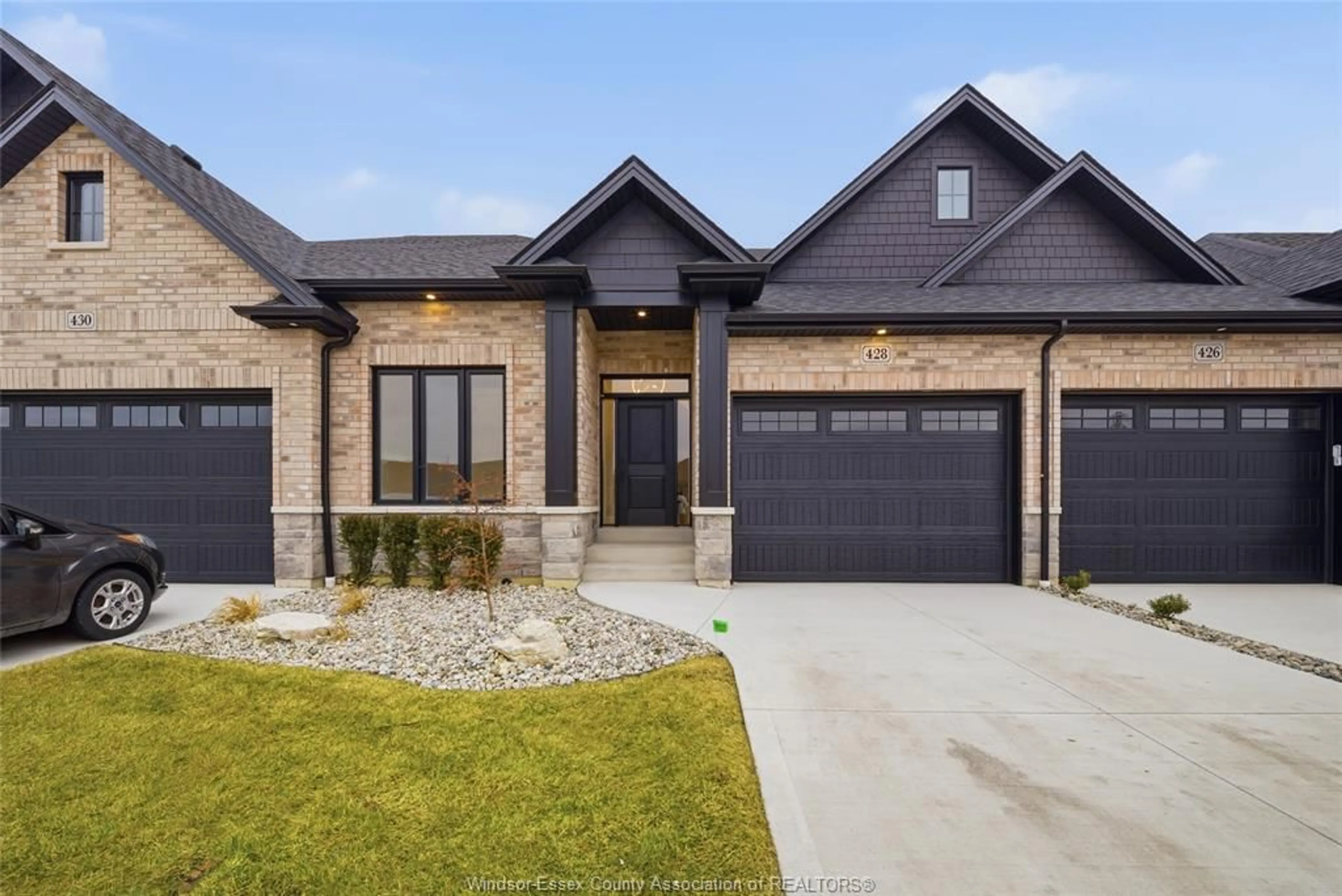 Home with brick exterior material, street for 447 CASERTA Cres, Lakeshore Ontario N0R 1A0