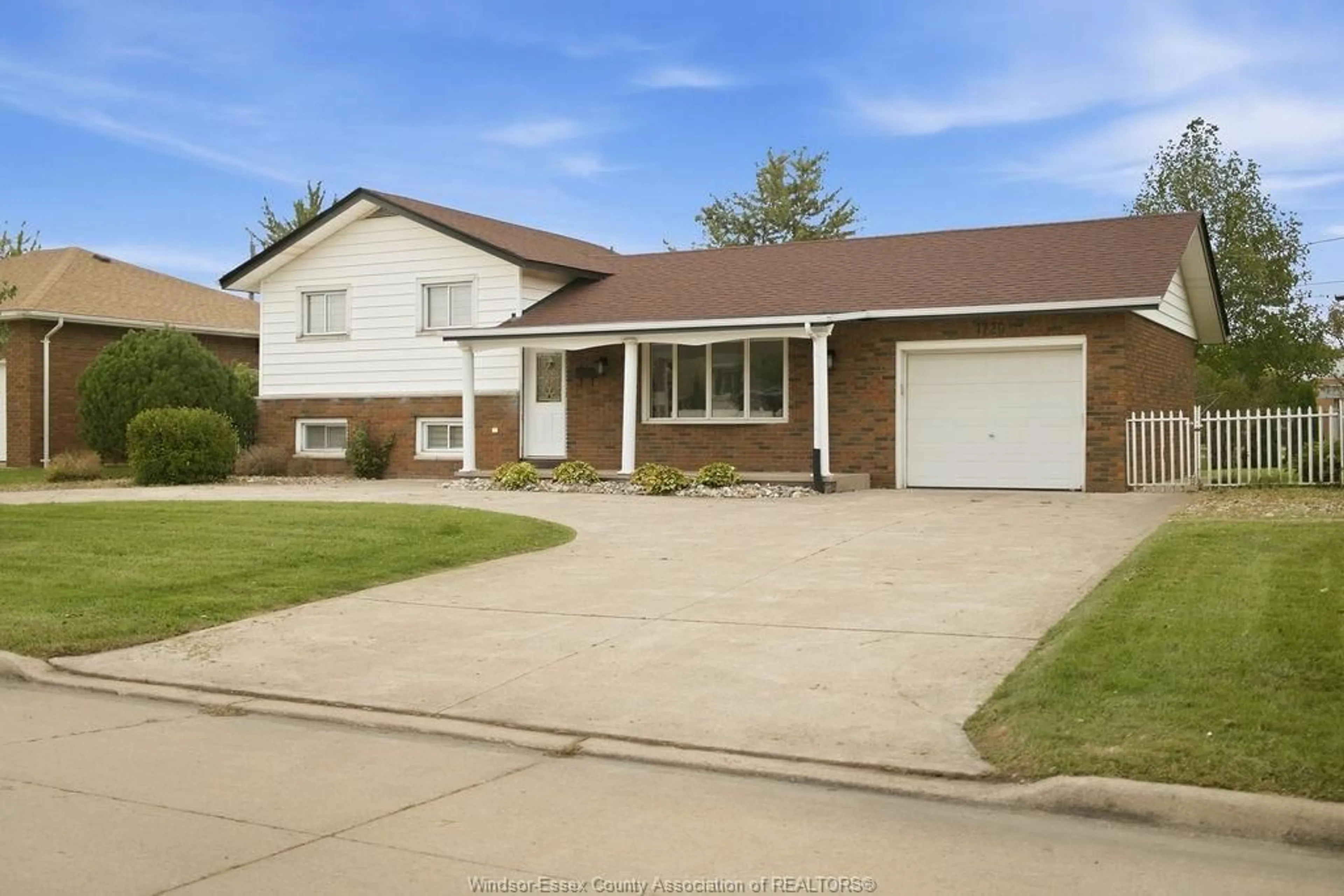 Home with vinyl exterior material, street for 1720 PARTINGTON, Windsor Ontario N8W 3R8