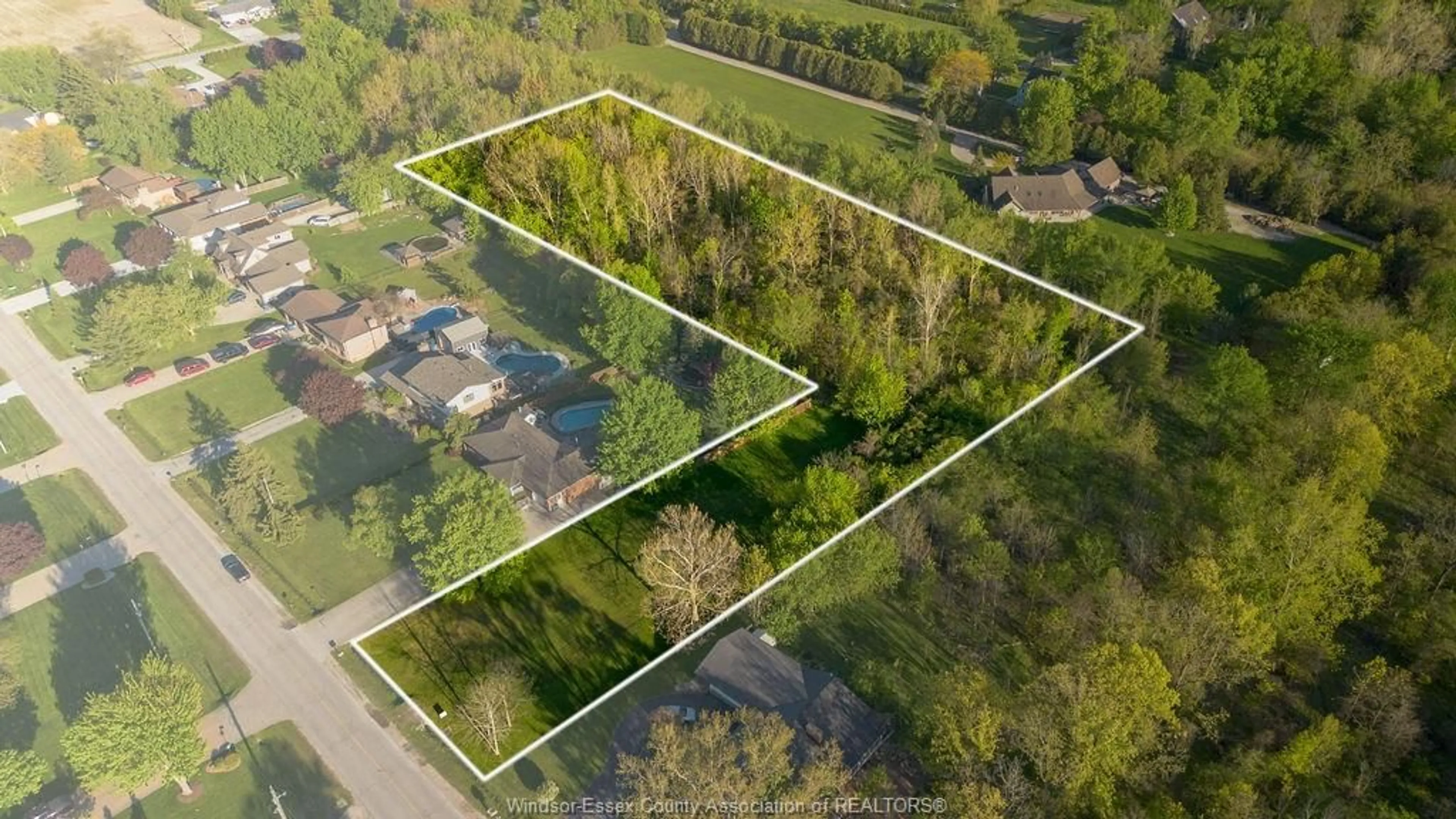 A pic from outside/outdoor area/front of a property/back of a property/a pic from drone, unknown for V/L BISSONNETTE Lane, Lakeshore Ontario N0R 1V0