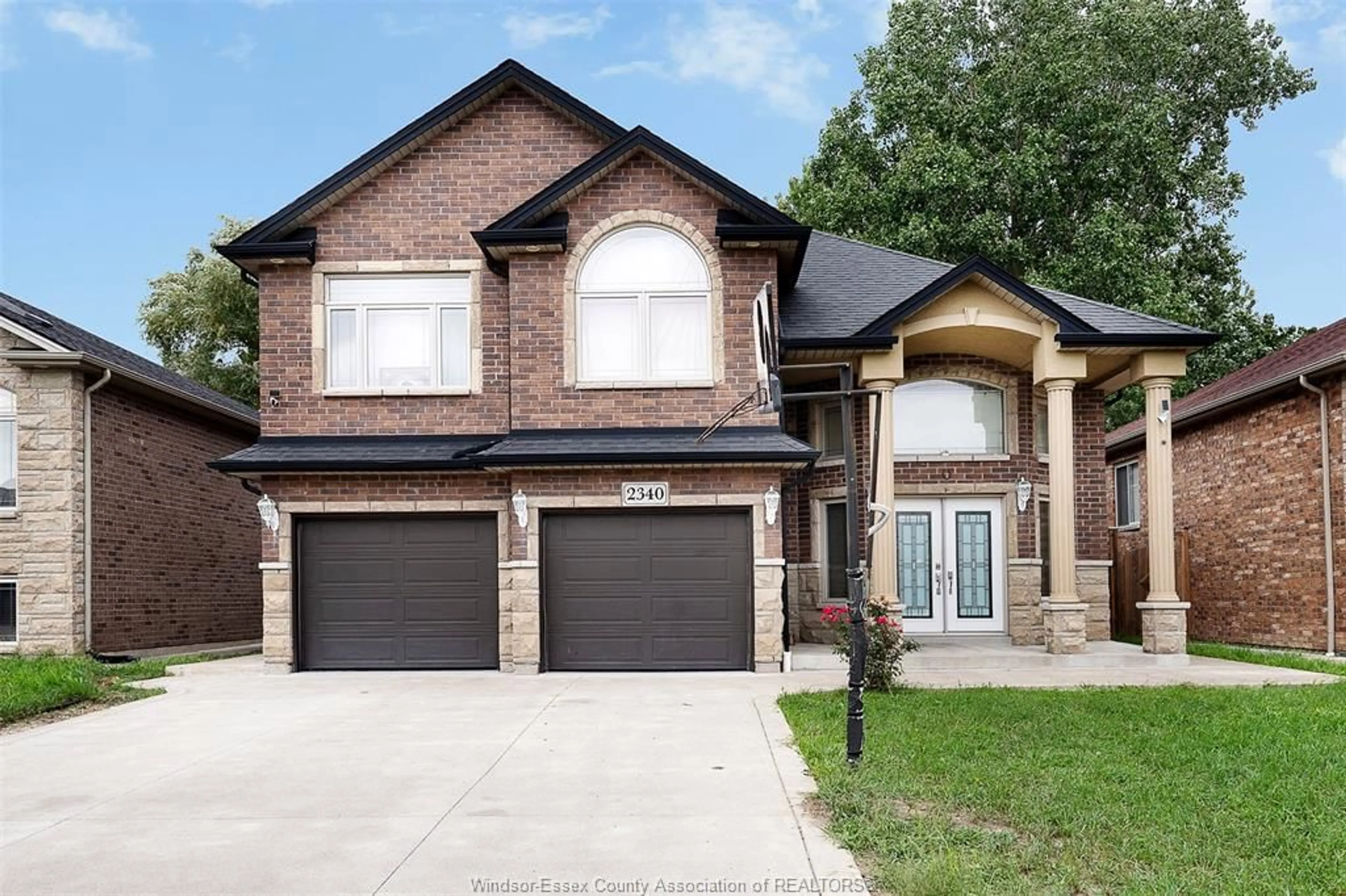 Home with brick exterior material, street for 2340 RANKIN Ave, Windsor Ontario N8B 3V8
