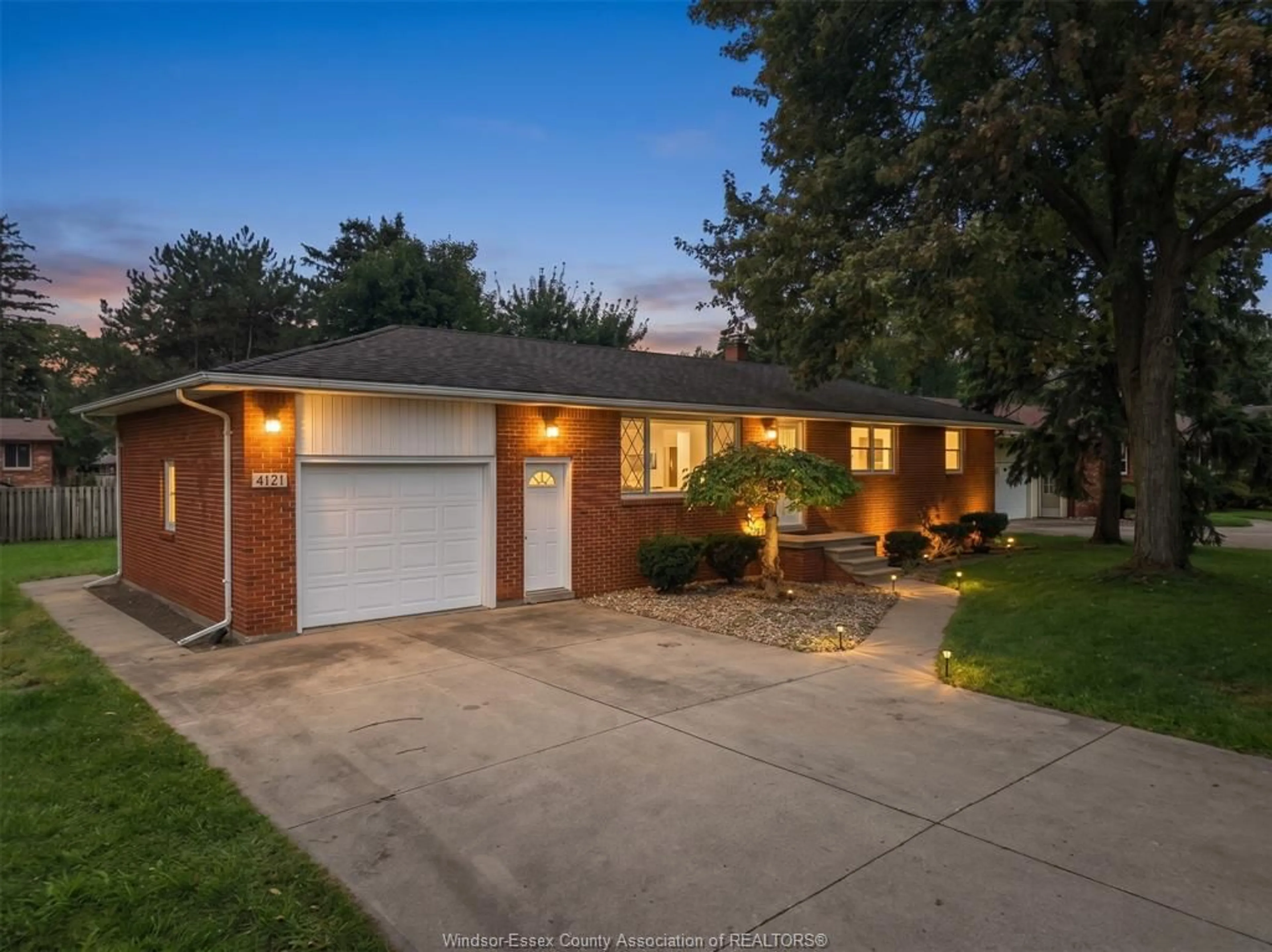 Home with brick exterior material, street for 4045 DOUGALL Ave, Windsor Ontario N9G 1X4