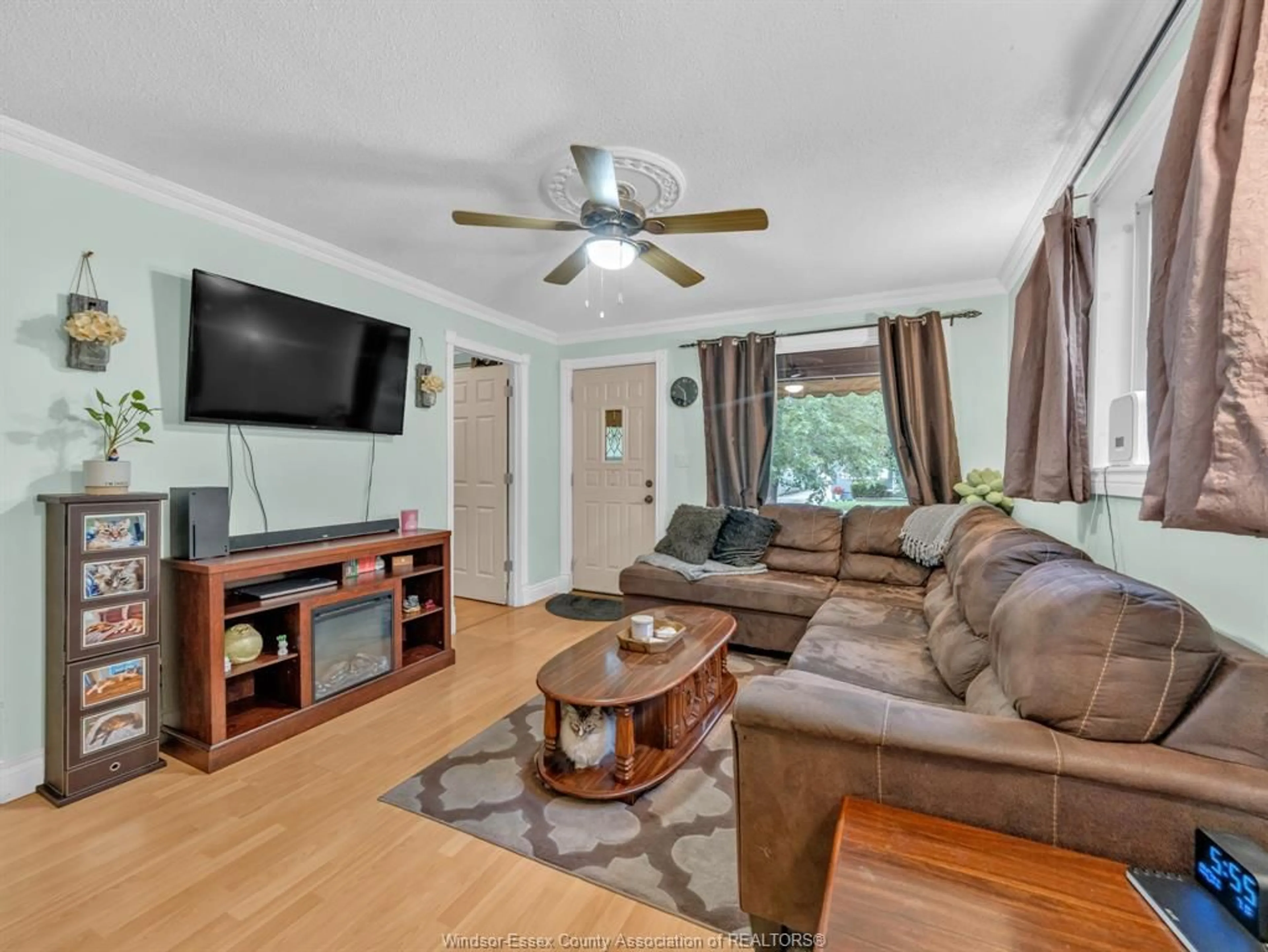 Living room with furniture, wood/laminate floor for 1826 FRANCOIS Rd, Windsor Ontario N8W 4S7