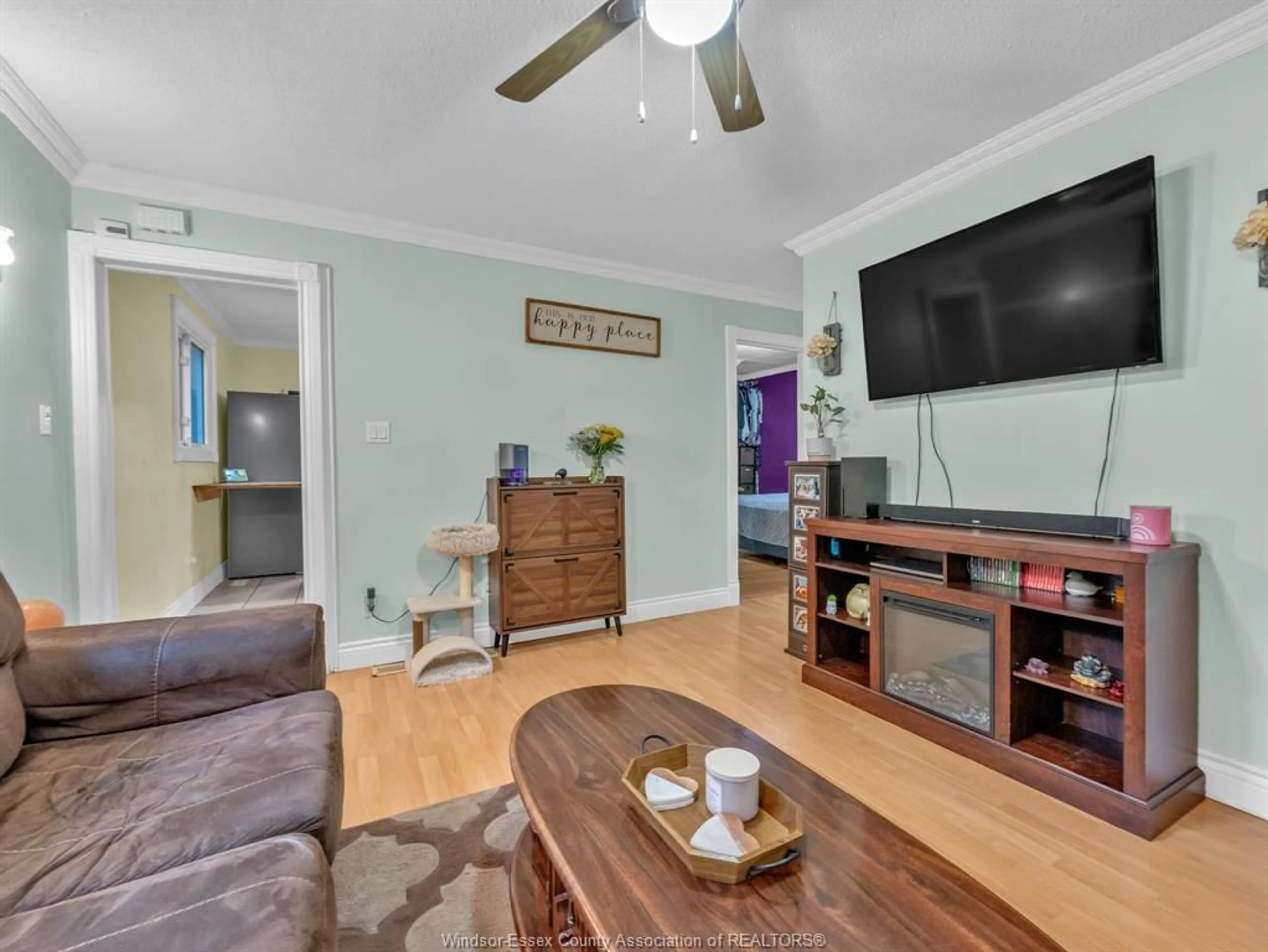 Living room with furniture, wood/laminate floor for 1826 FRANCOIS Rd, Windsor Ontario N8W 4S7