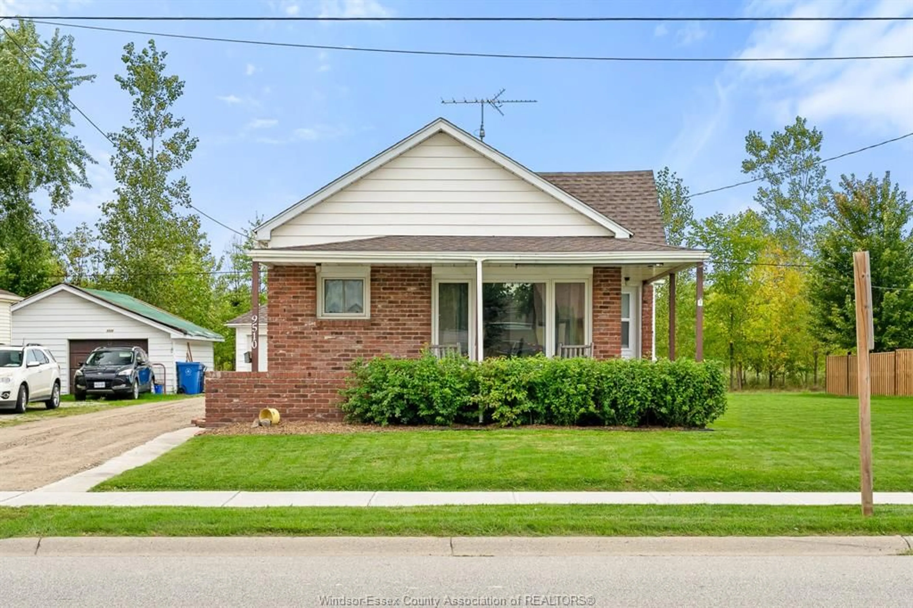 Home with brick exterior material, street for 9510 WALKER Rd, McGregor Ontario N0R 1J0