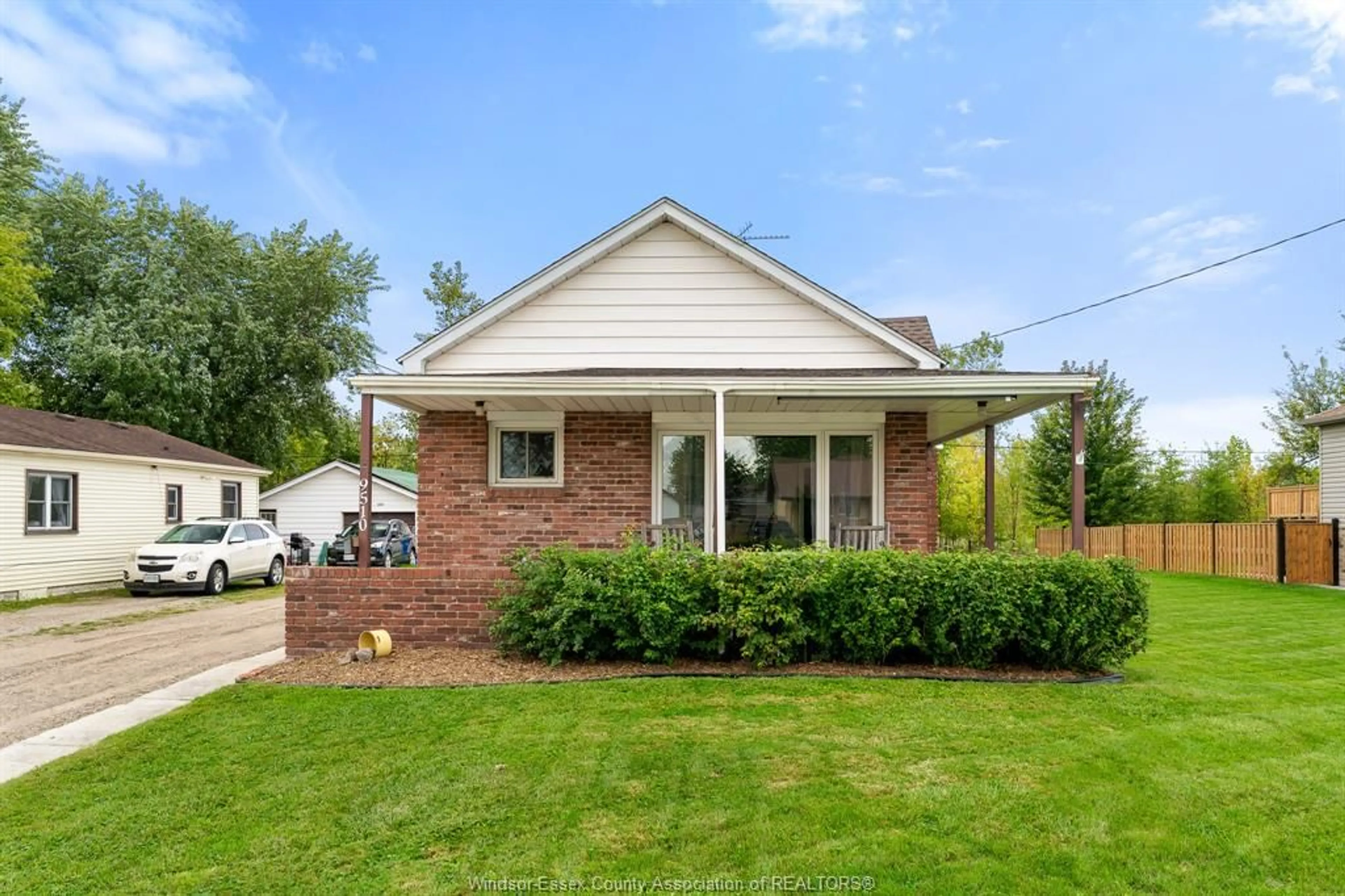 Home with brick exterior material, street for 9510 WALKER Rd, McGregor Ontario N0R 1J0