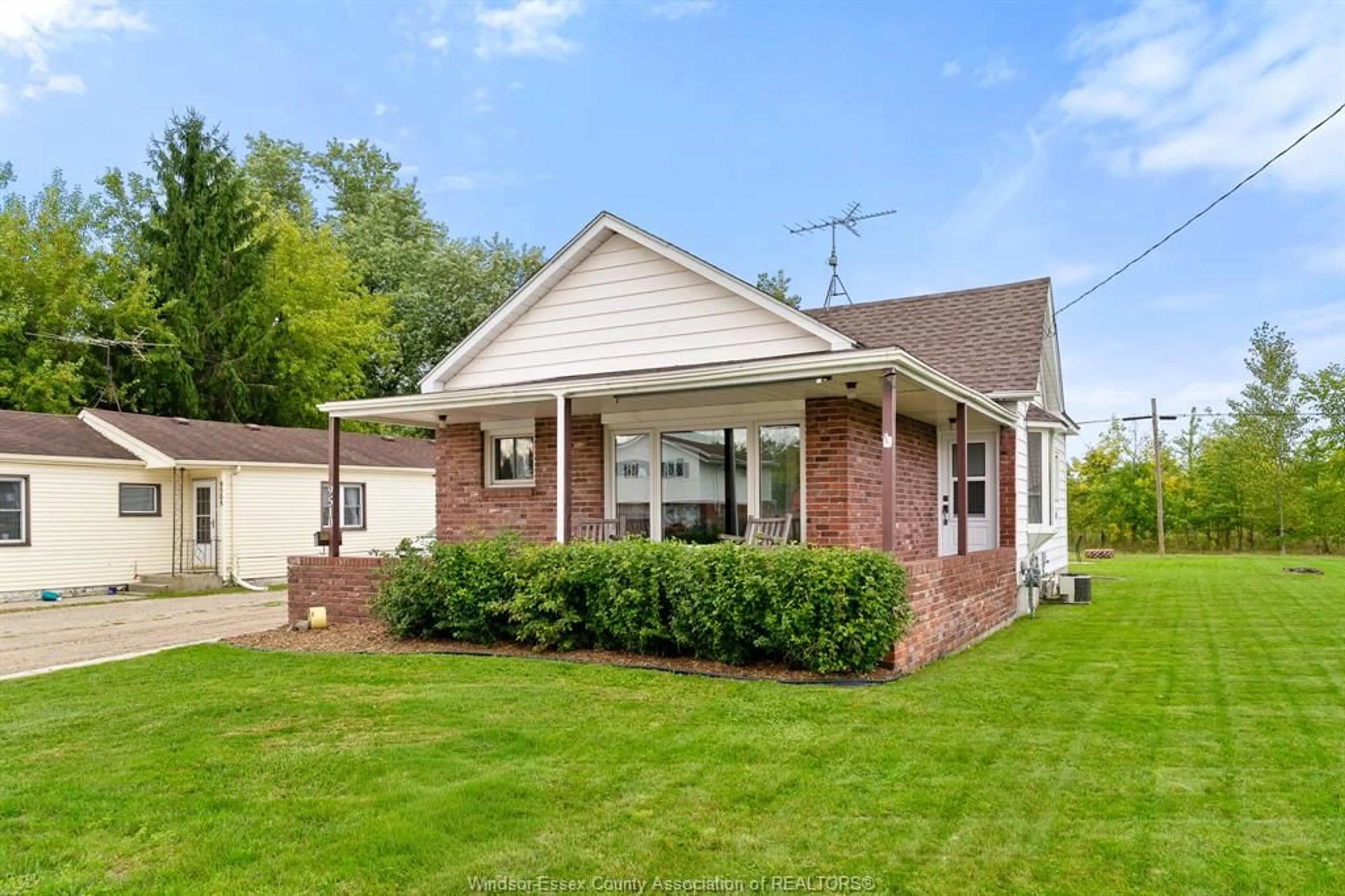 Home with brick exterior material, street for 9510 WALKER Rd, McGregor Ontario N0R 1J0