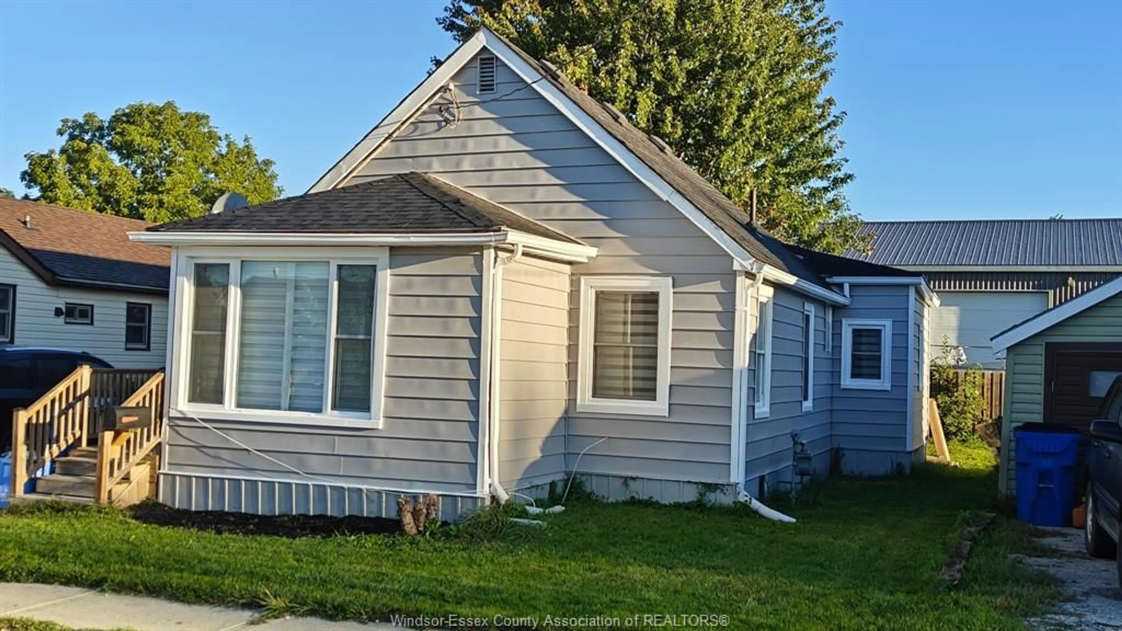 Home with vinyl exterior material, street for 13 WILLS St, Wallaceburg Ontario N8A 1A1