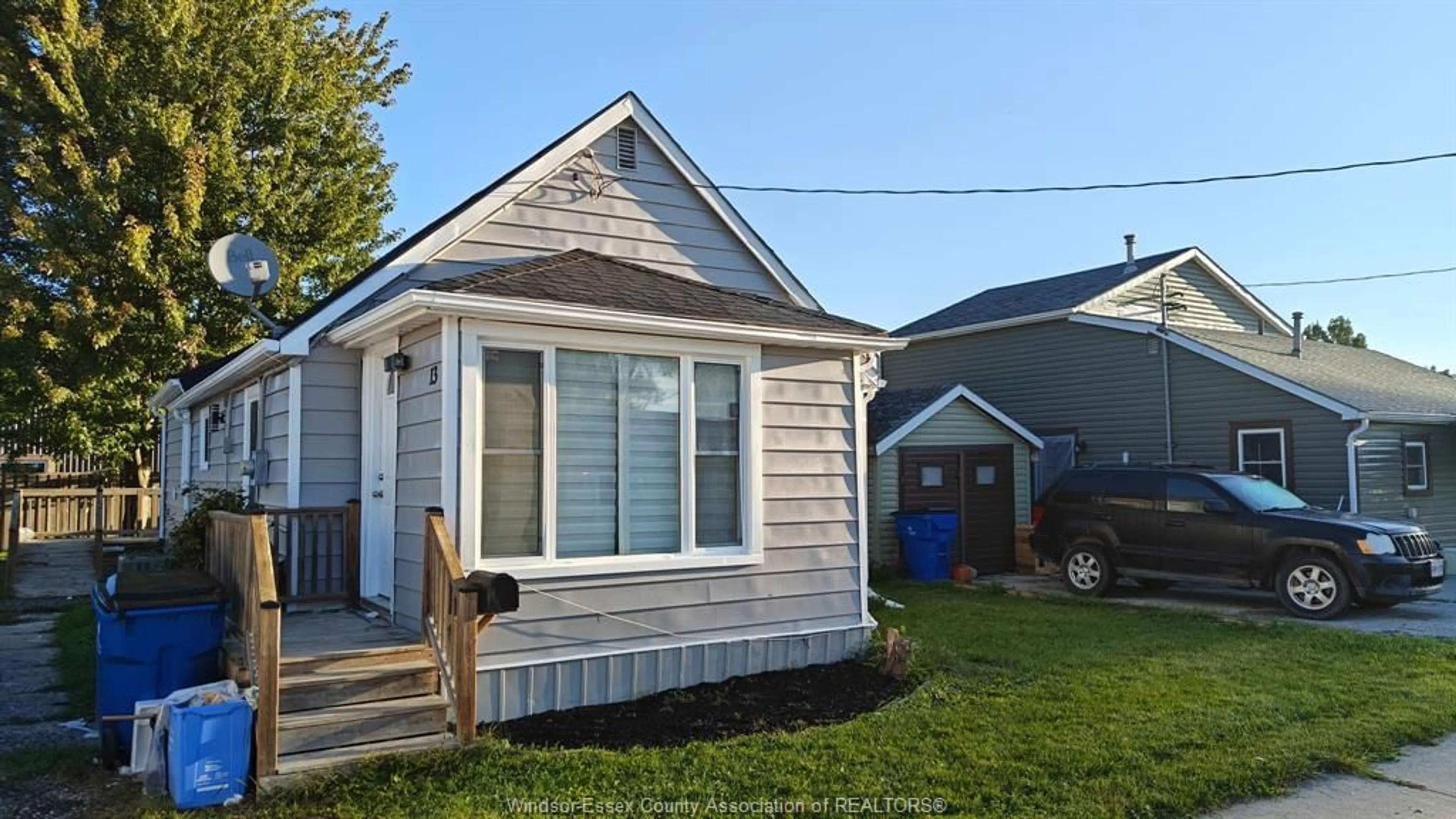 Home with vinyl exterior material, street for 13 WILLS St, Wallaceburg Ontario N8A 1A1