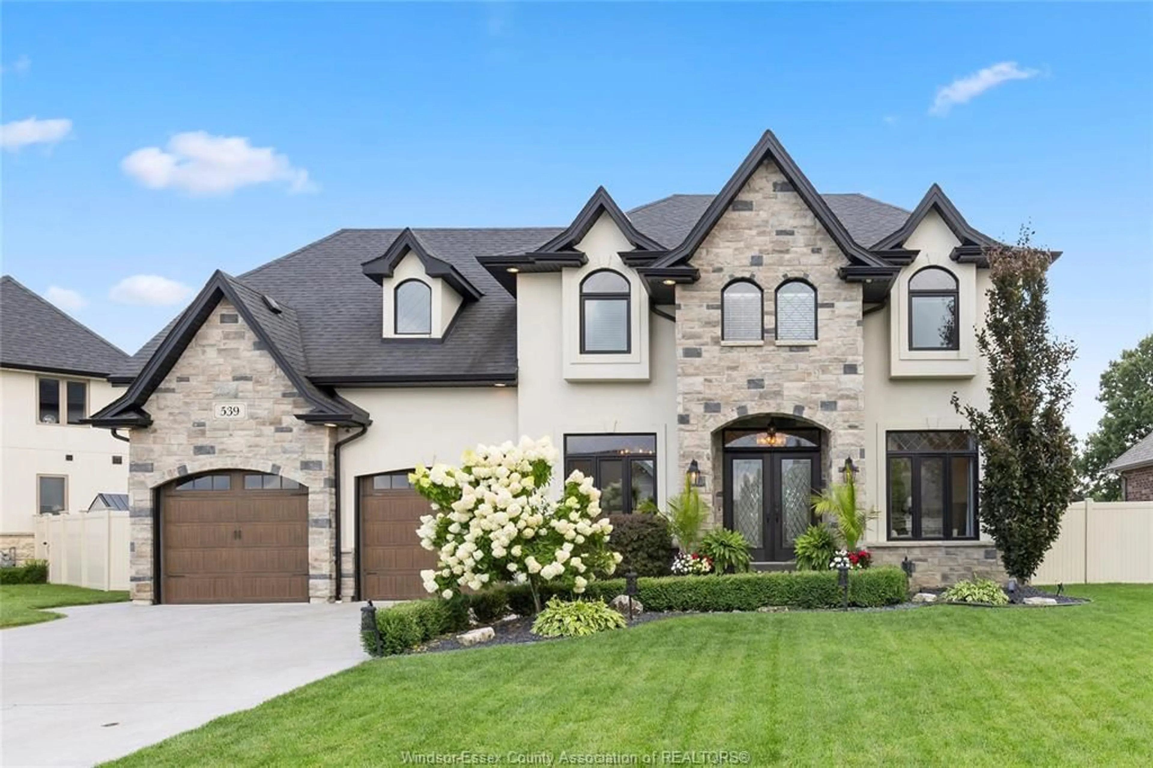 Home with brick exterior material, street for 539 RIVER DOWNS Ave, Lakeshore Ontario N0R 1A0