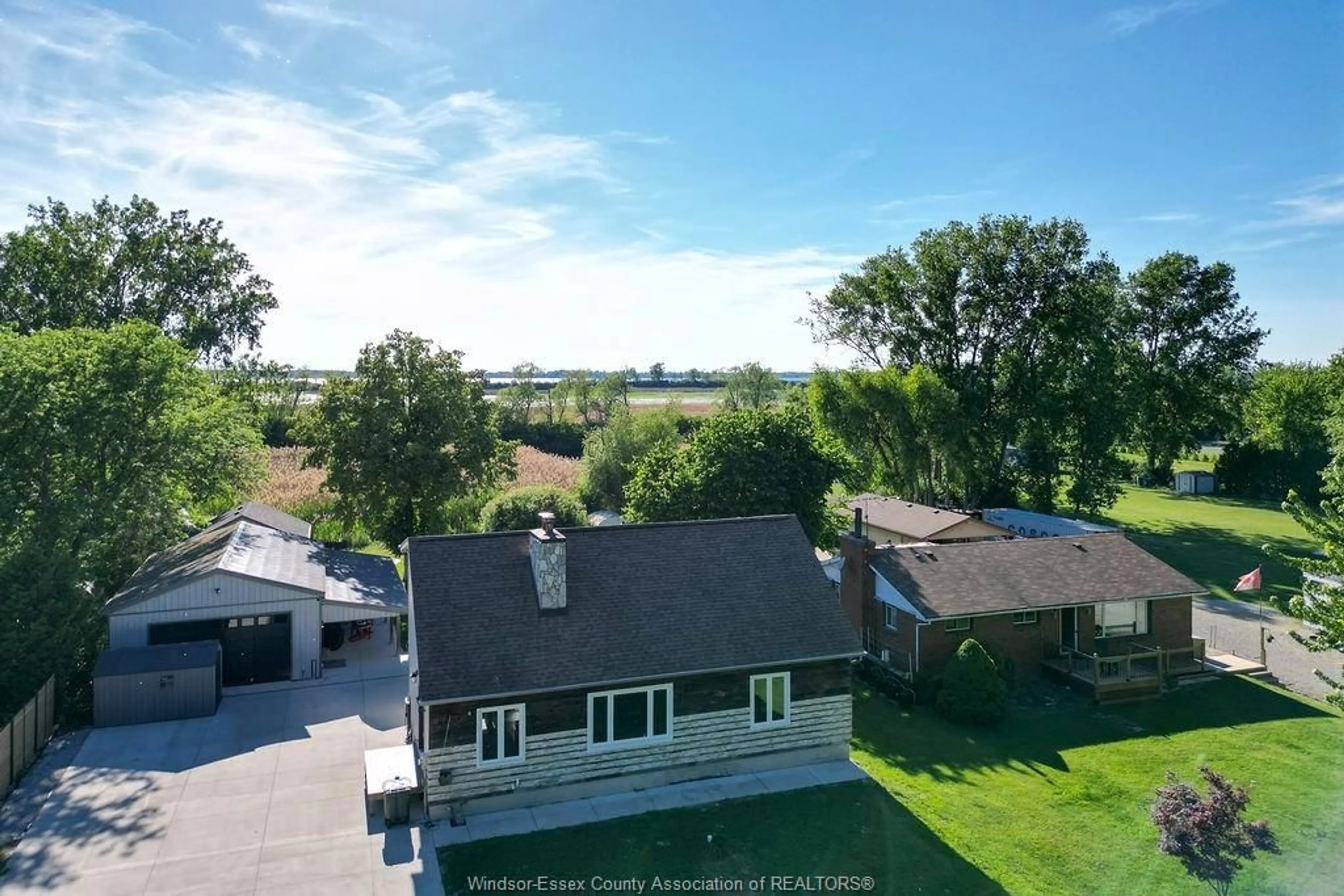 A pic from outside/outdoor area/front of a property/back of a property/a pic from drone, water/lake/river/ocean view for 2040 FRONT Rd, Amherstburg Ontario N9V 3R3