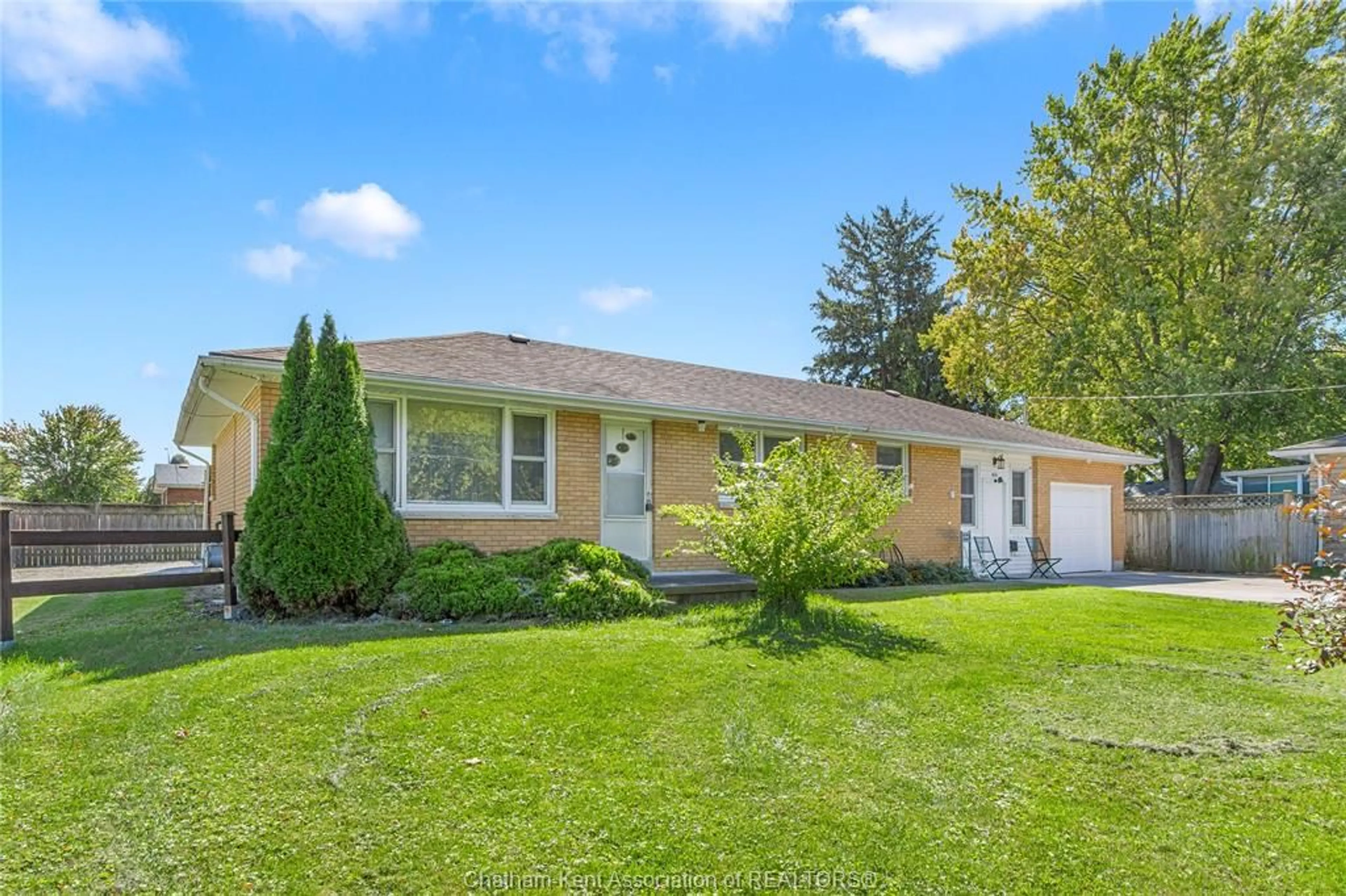 Home with brick exterior material, street for 410 MCNAUGHTON Ave, Chatham Ontario N7L 2G9