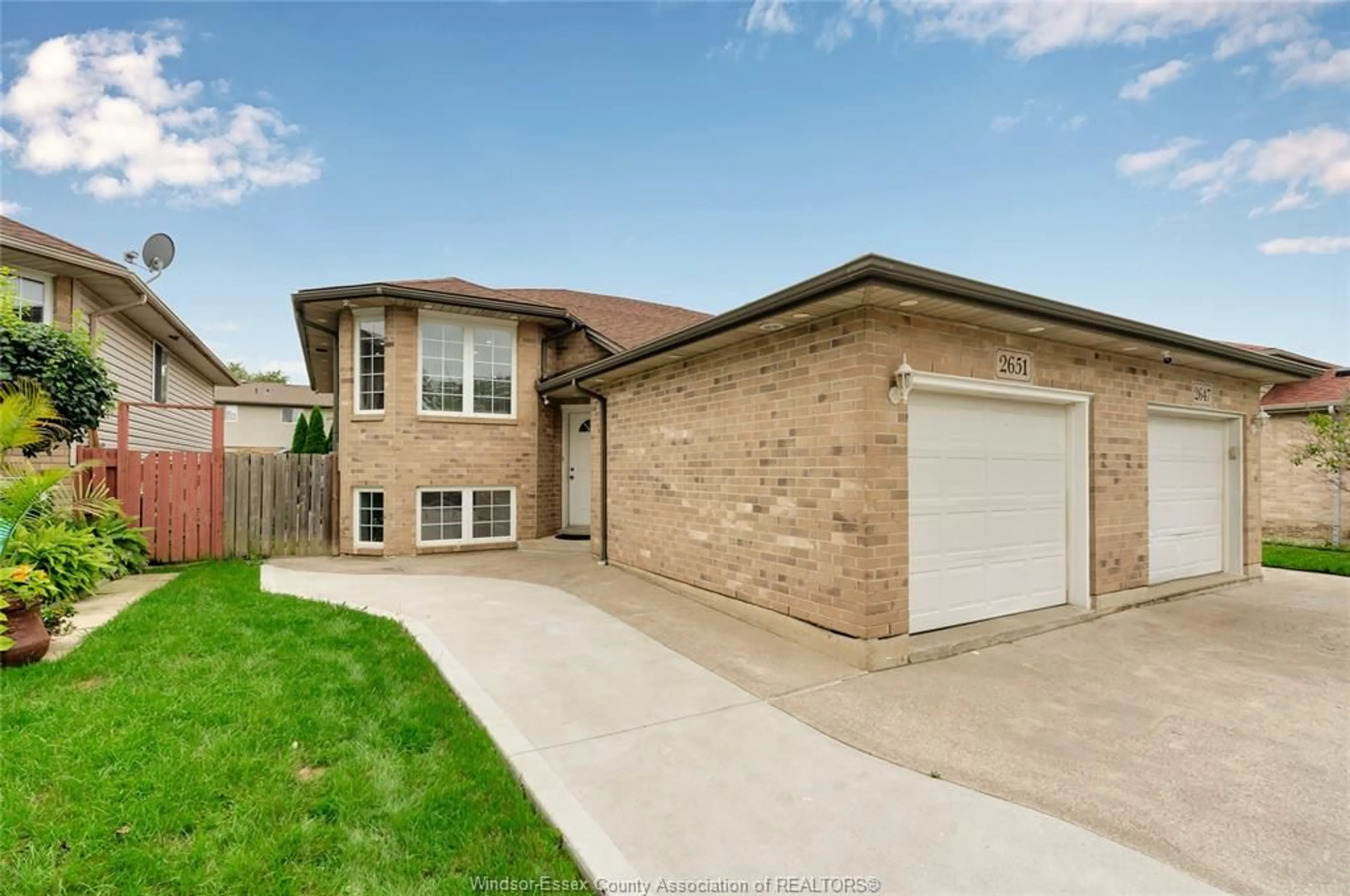 Home with brick exterior material, street for 2651 TEEDIE Cres, Windsor Ontario N8R 2K5