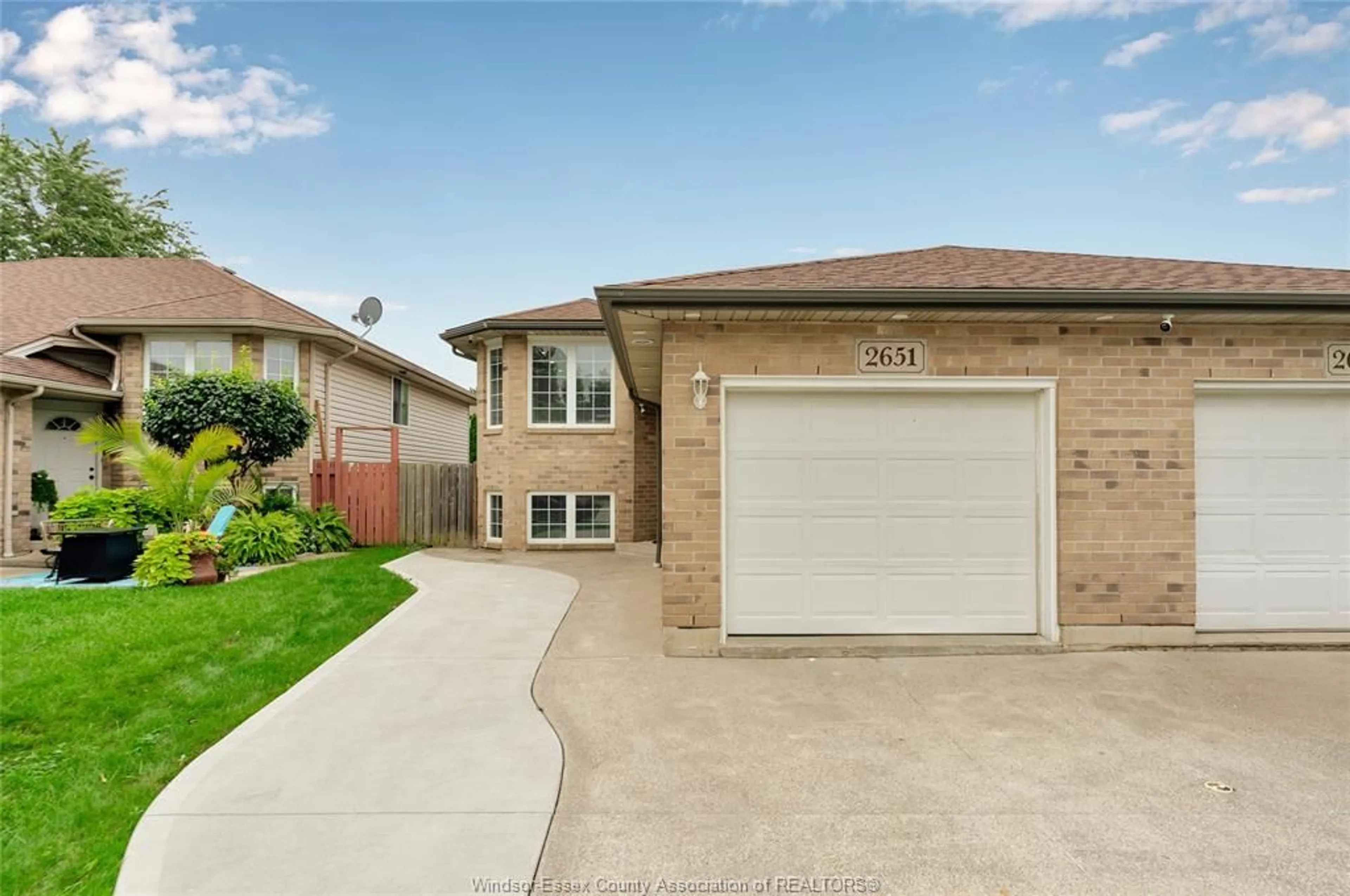 Home with brick exterior material, street for 2651 TEEDIE Cres, Windsor Ontario N8R 2K5