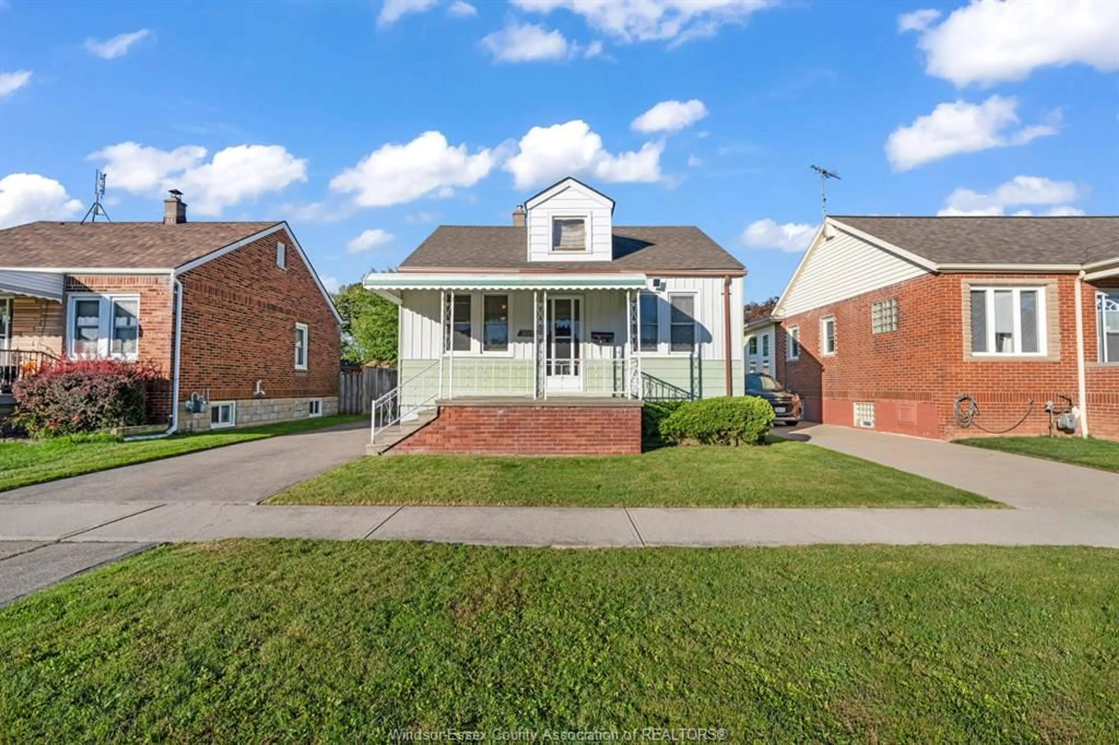 Home with brick exterior material, street for 1669 HICKORY Rd, Windsor Ontario N8Y 3T2