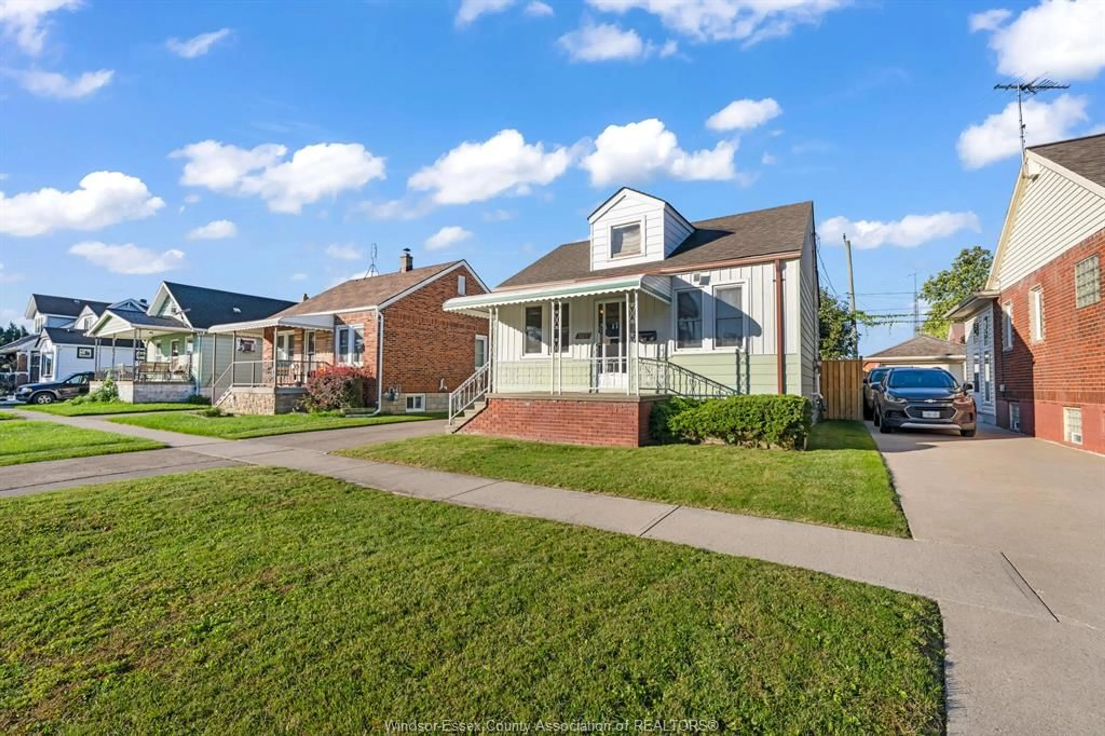 Home with brick exterior material, street for 1669 HICKORY Rd, Windsor Ontario N8Y 3T2