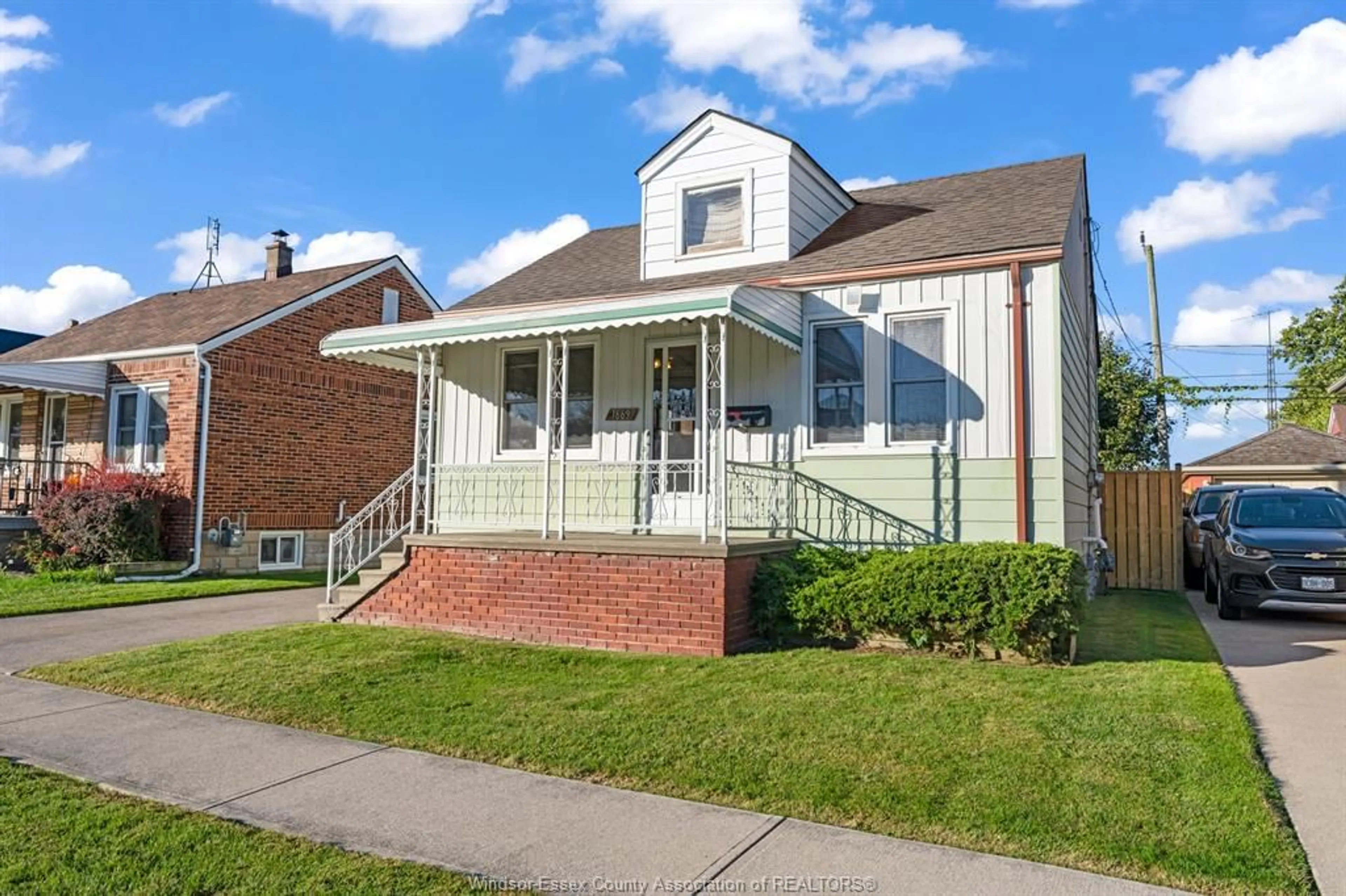 Home with brick exterior material, street for 1669 HICKORY Rd, Windsor Ontario N8Y 3T2