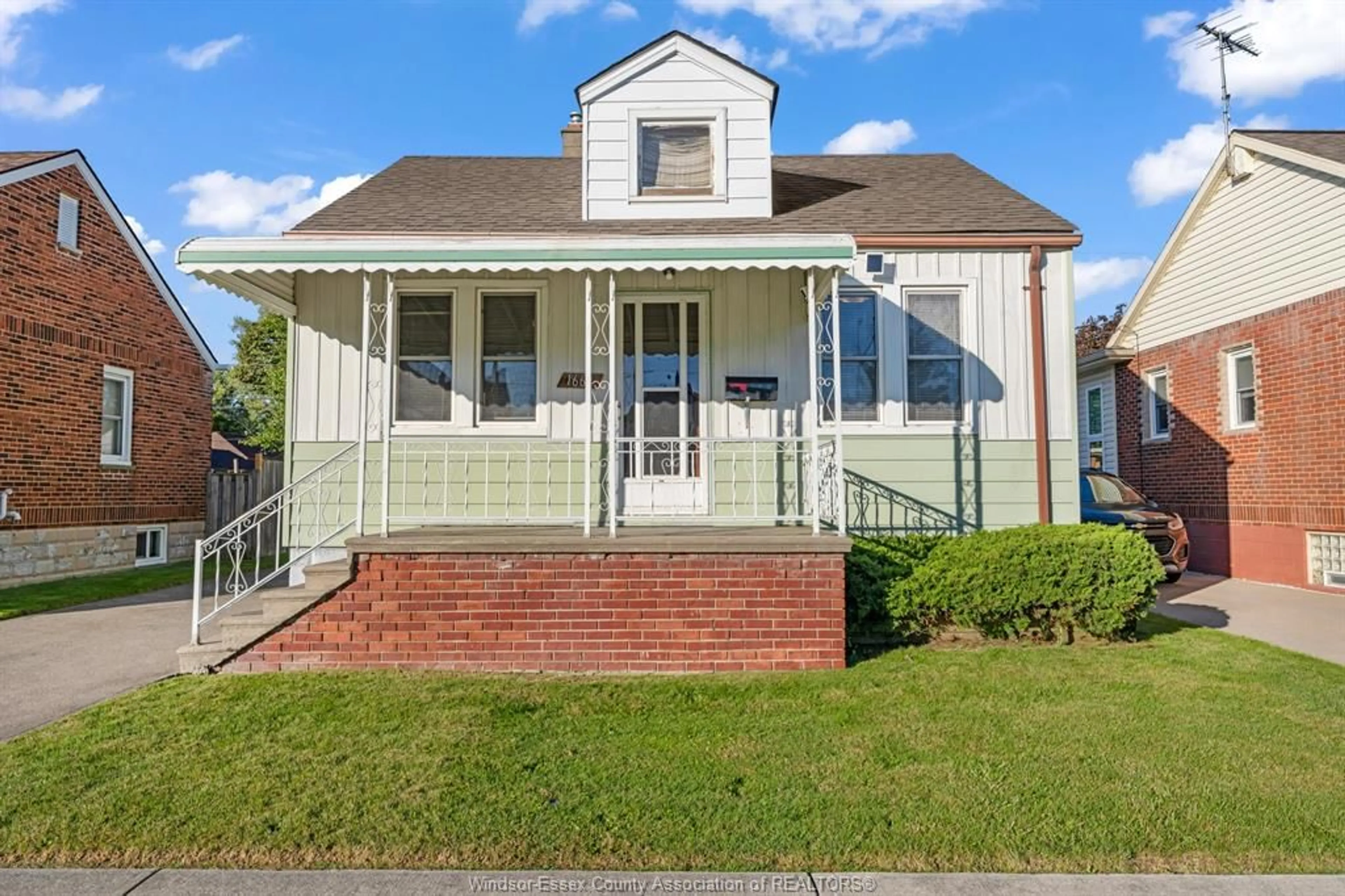 Home with vinyl exterior material, street for 1669 HICKORY Rd, Windsor Ontario N8Y 3T2