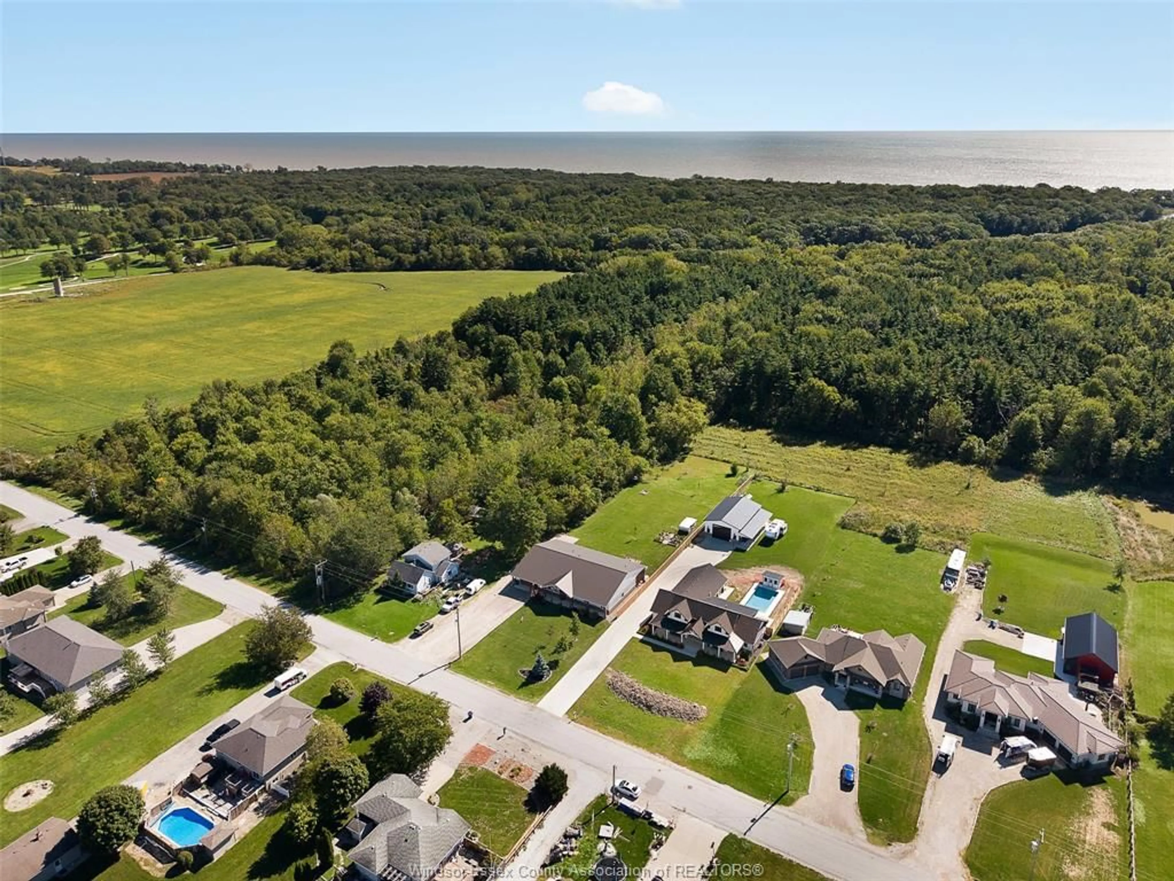 A pic from outside/outdoor area/front of a property/back of a property/a pic from drone, water/lake/river/ocean view for 622 MIDDLETON Line, Wheatley Ontario N0P 2P0