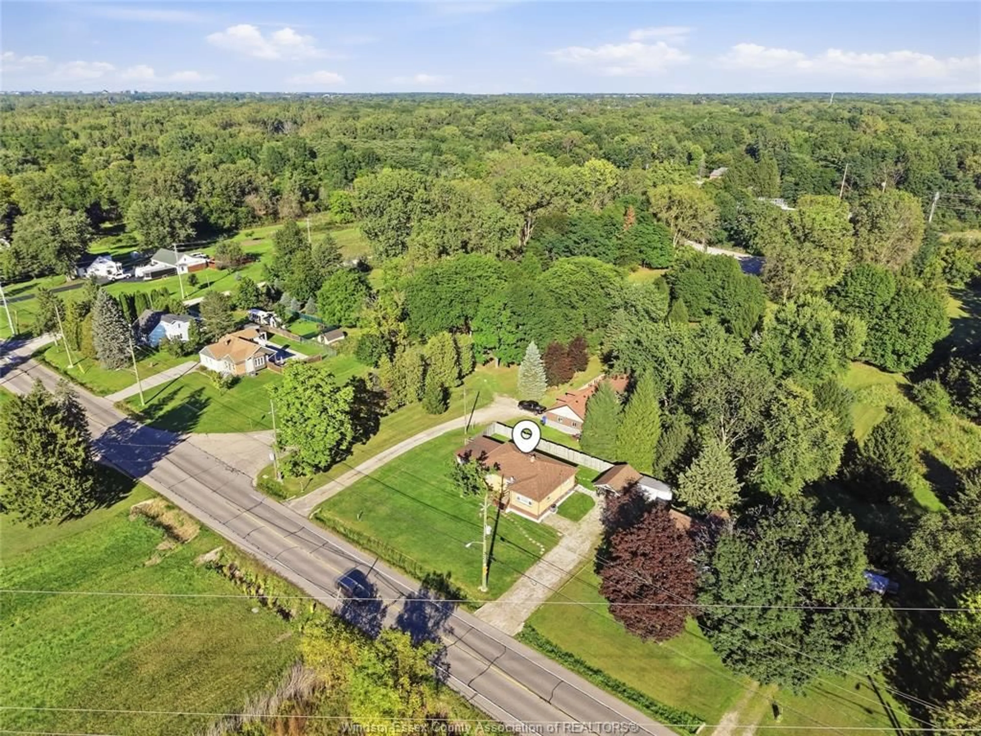 A pic from outside/outdoor area/front of a property/back of a property/a pic from drone, forest/trees view for 5505 MALDEN Rd, Windsor Ontario N9E 3W1