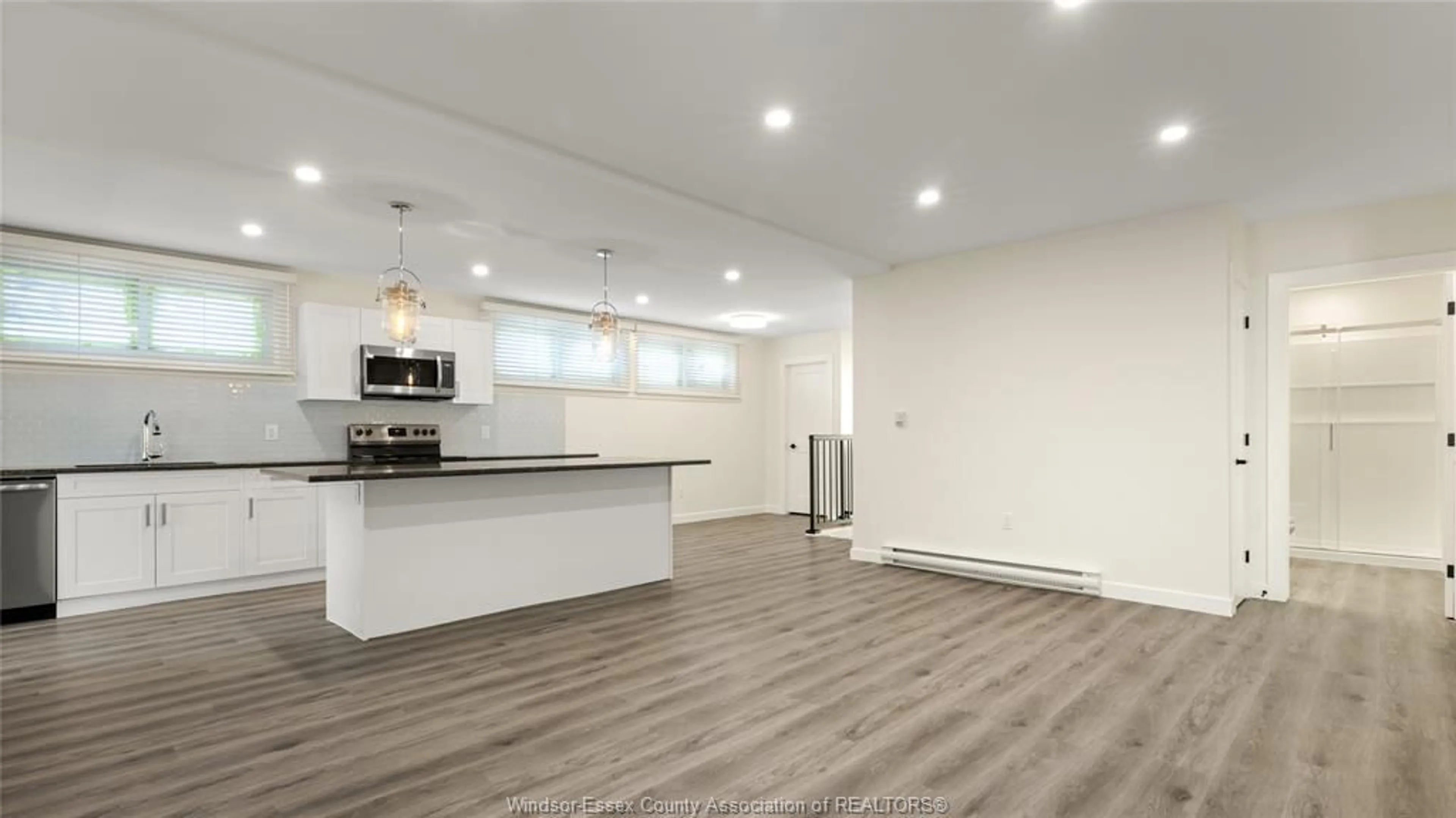 Open concept kitchen, wood/laminate floor for 2605 SEMINOLE #UNIT 2, Windsor Ontario N8Y 1X6