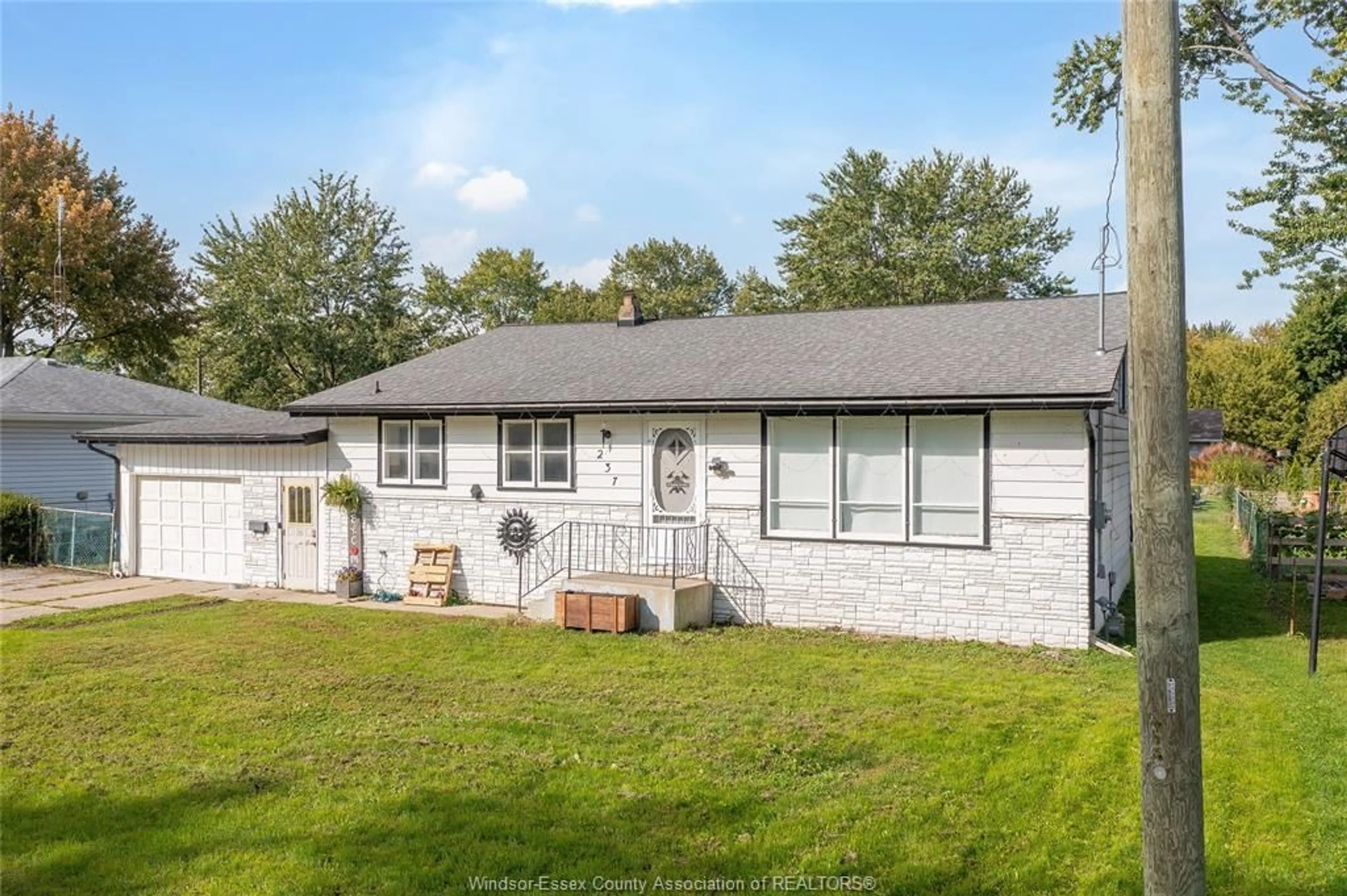 Home with vinyl exterior material, street for 237 SAINT MARY'S Rd, Lakeshore Ontario N0R 1C0