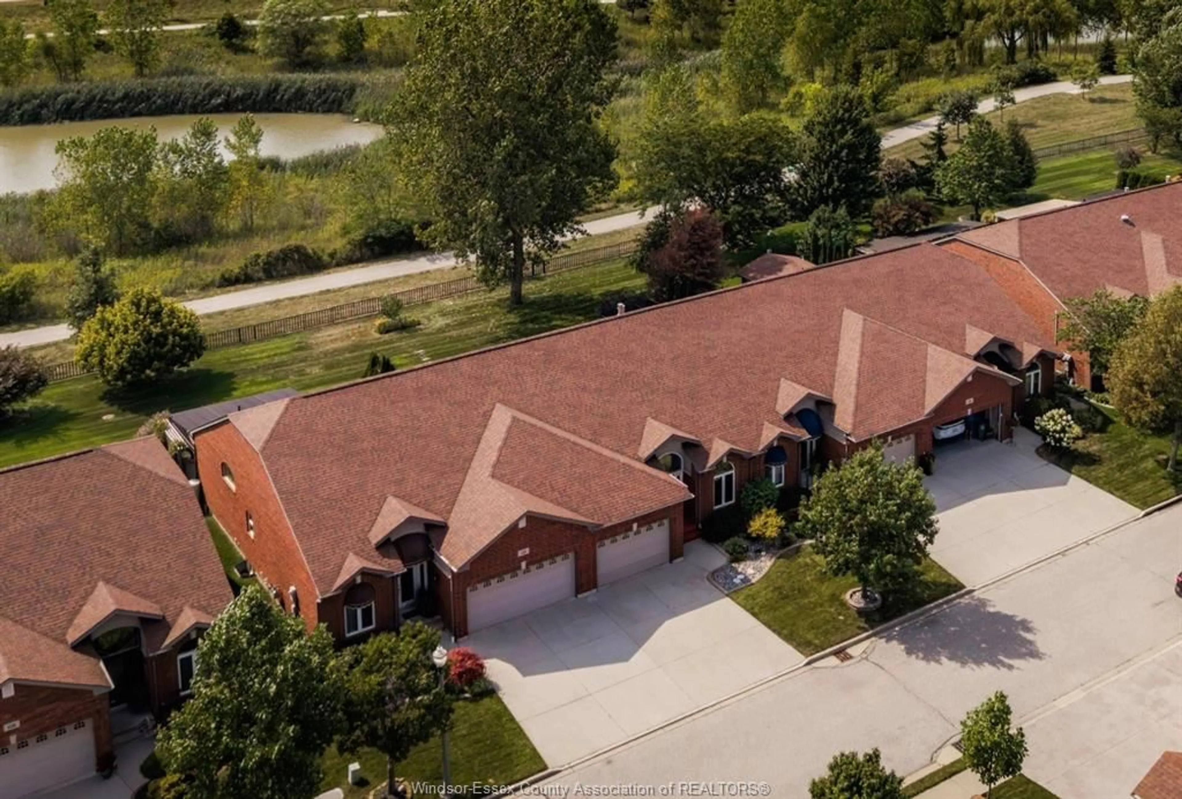 A pic from outside/outdoor area/front of a property/back of a property/a pic from drone, street for 1519 Aspenshore Ave, Windsor Ontario N8P 1Y4