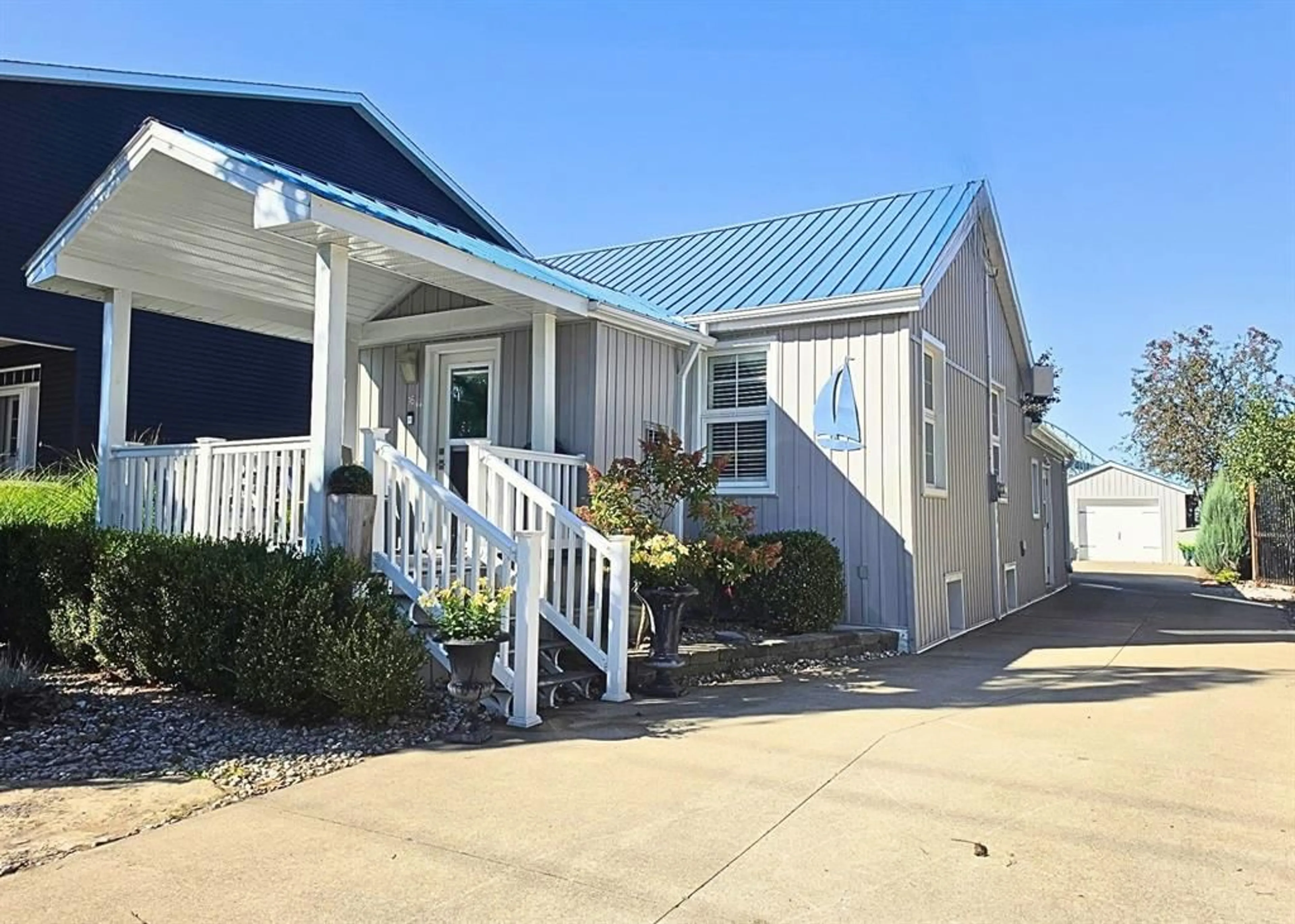 Home with vinyl exterior material, water/lake/river/ocean view for 16 Fort St, Point Edward Ontario N7V 1M2