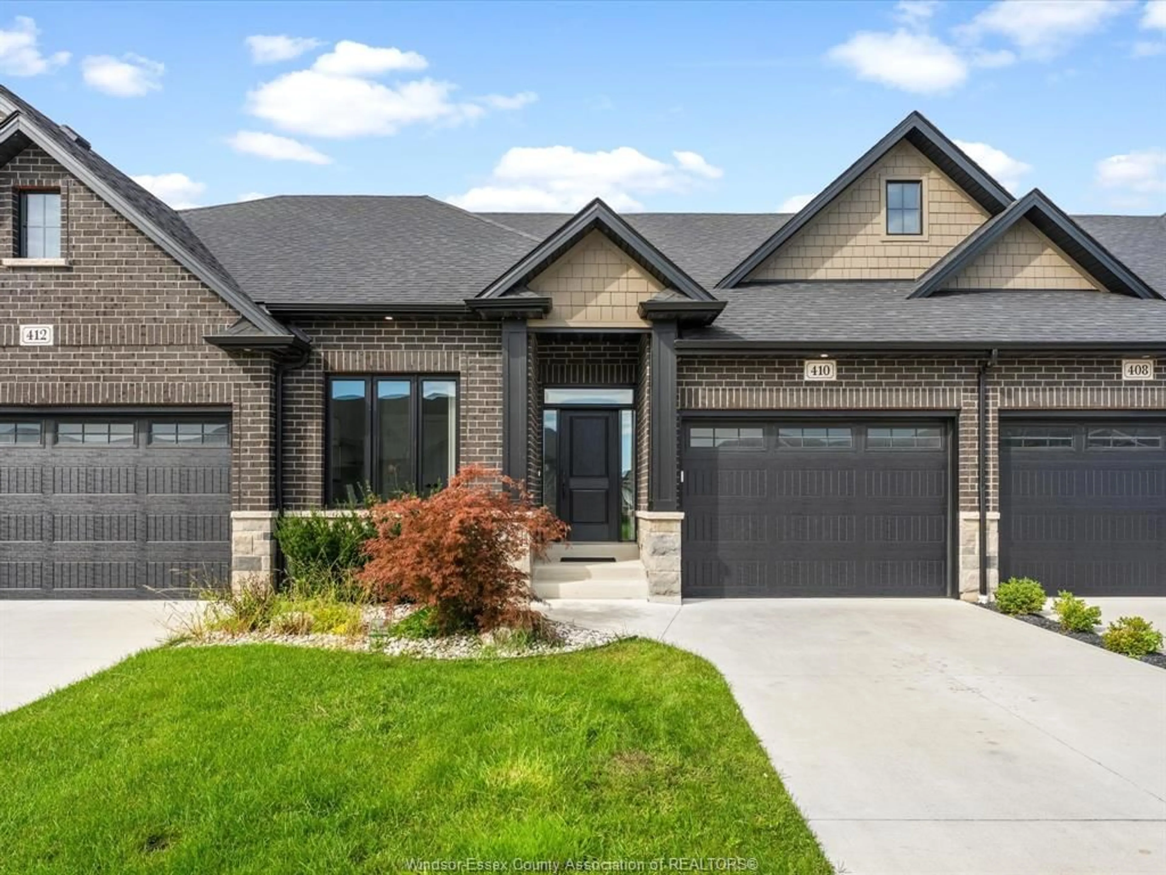 Home with brick exterior material, street for 410 CASERTA Cres, Lakeshore Ontario N0R 1Z0