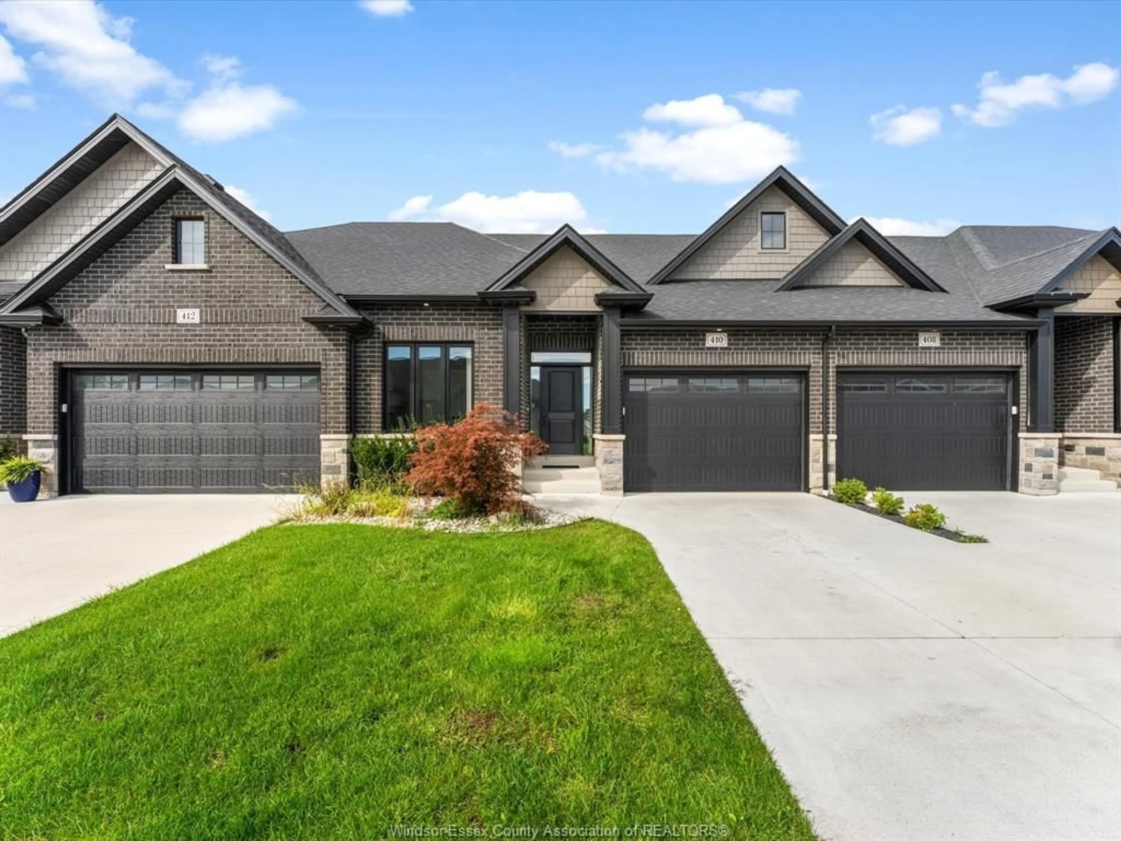 Home with brick exterior material, street for 410 CASERTA Cres, Lakeshore Ontario N0R 1Z0