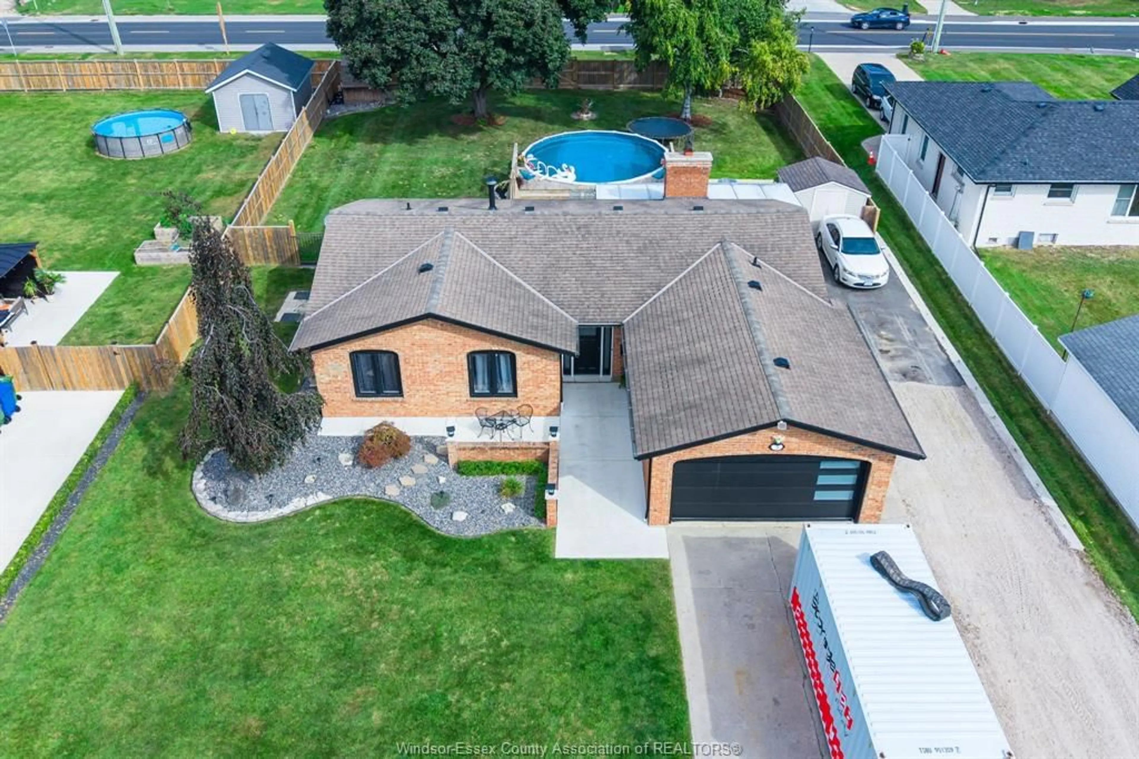 A pic from outside/outdoor area/front of a property/back of a property/a pic from drone, street for 3 Fischer Cres, Leamington Ontario N8H 4S6