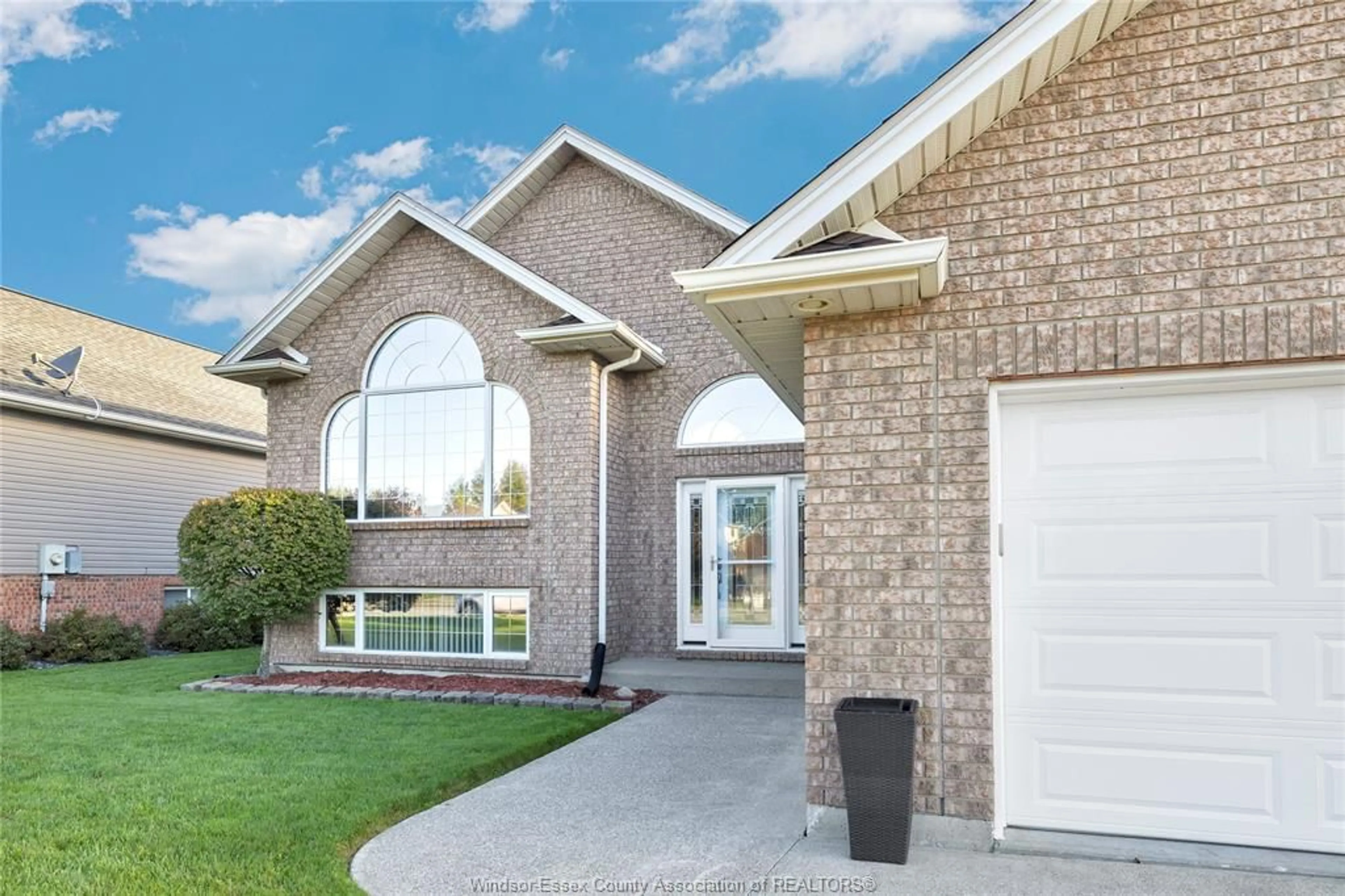 Home with brick exterior material, street for 237 WOODVIEW Dr, Essex Ontario N8M 3E9