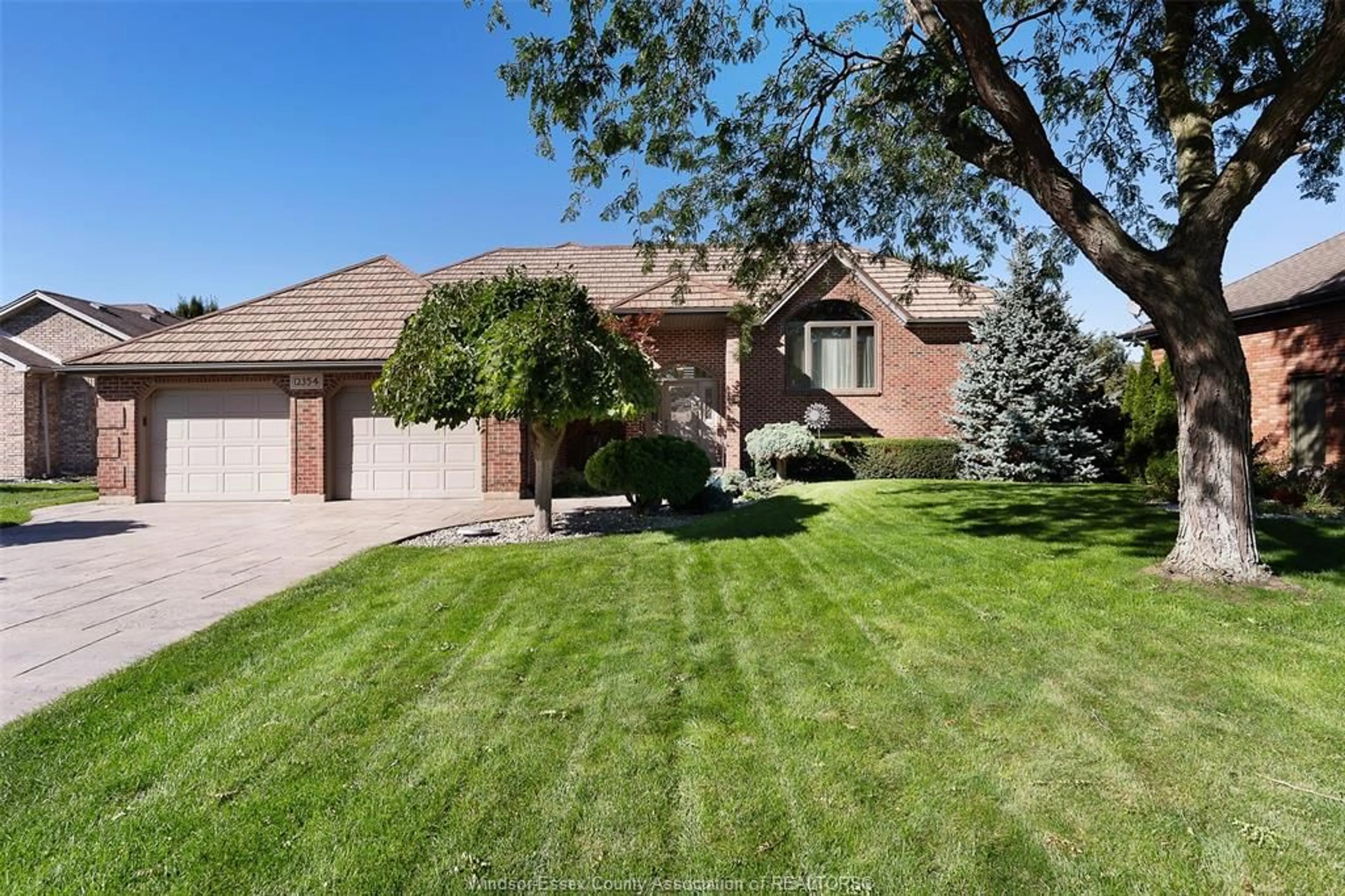 Home with brick exterior material, street for 12354 FUNARO Cres, Tecumseh Ontario N9K 1C4