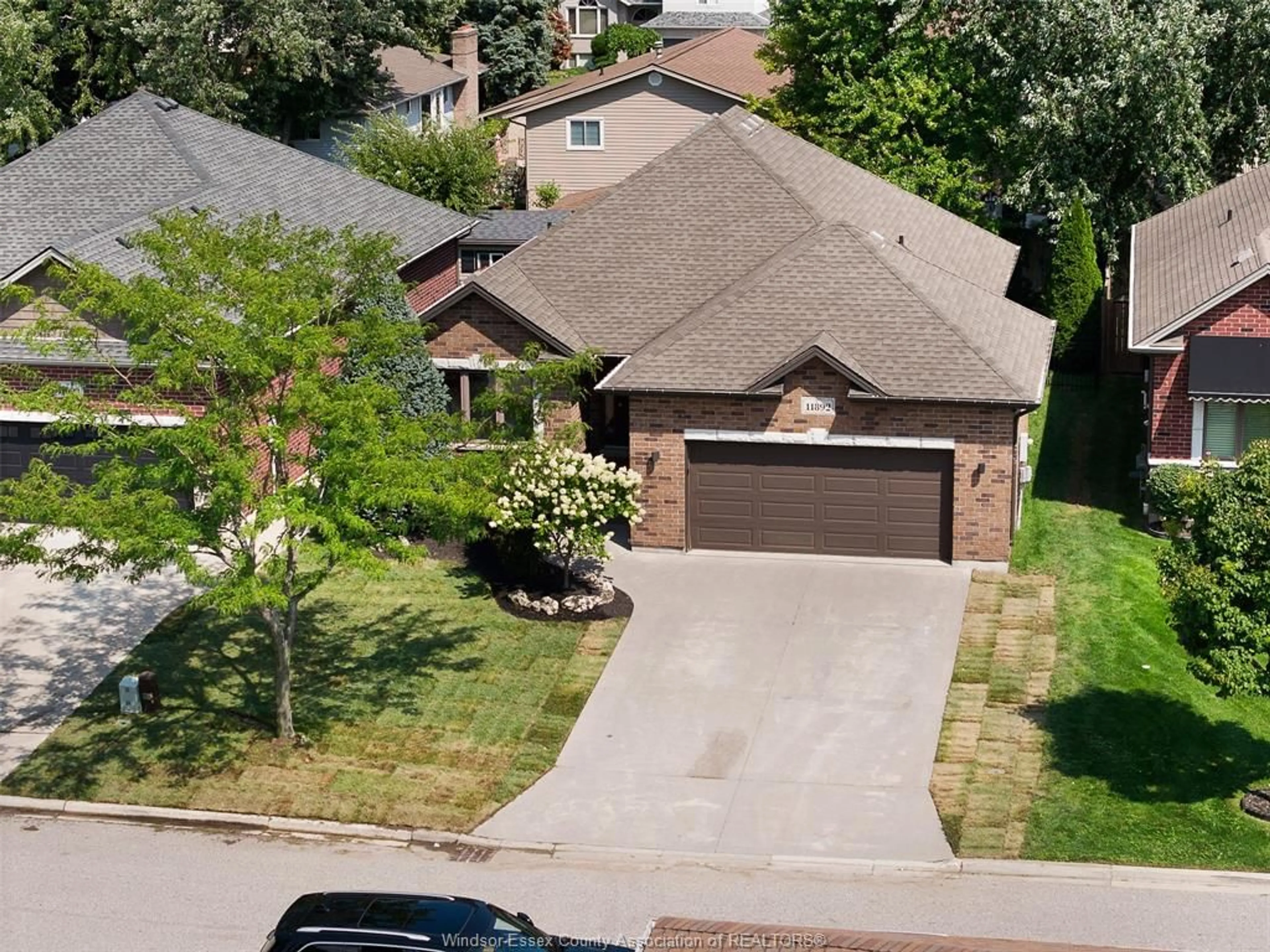 A pic from outside/outdoor area/front of a property/back of a property/a pic from drone, street for 11892 Boulder Cres, Windsor Ontario N8P 1Z4