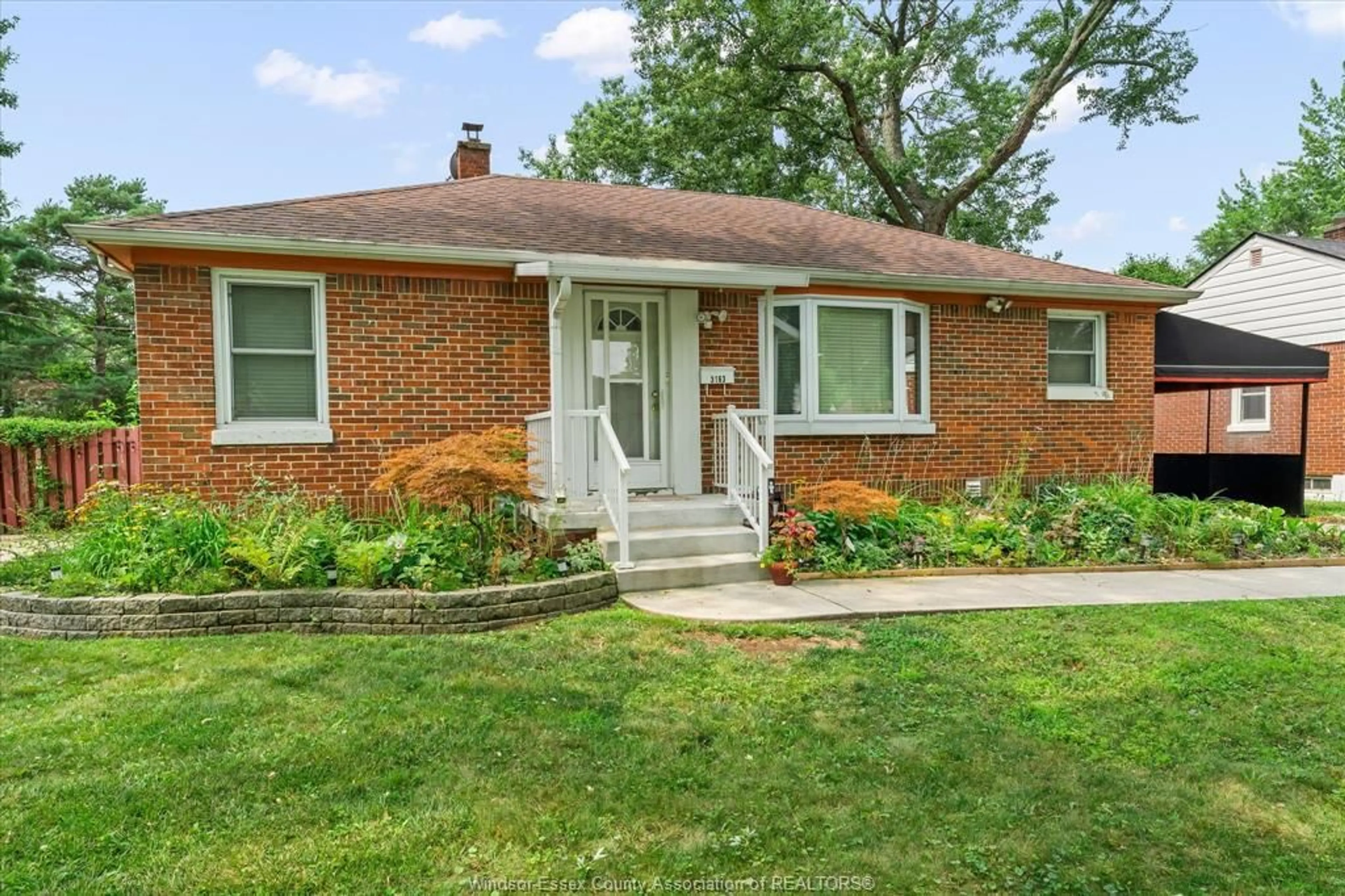 Home with brick exterior material, street for 3163 Curry Ave, Windsor Ontario N9E 2T2