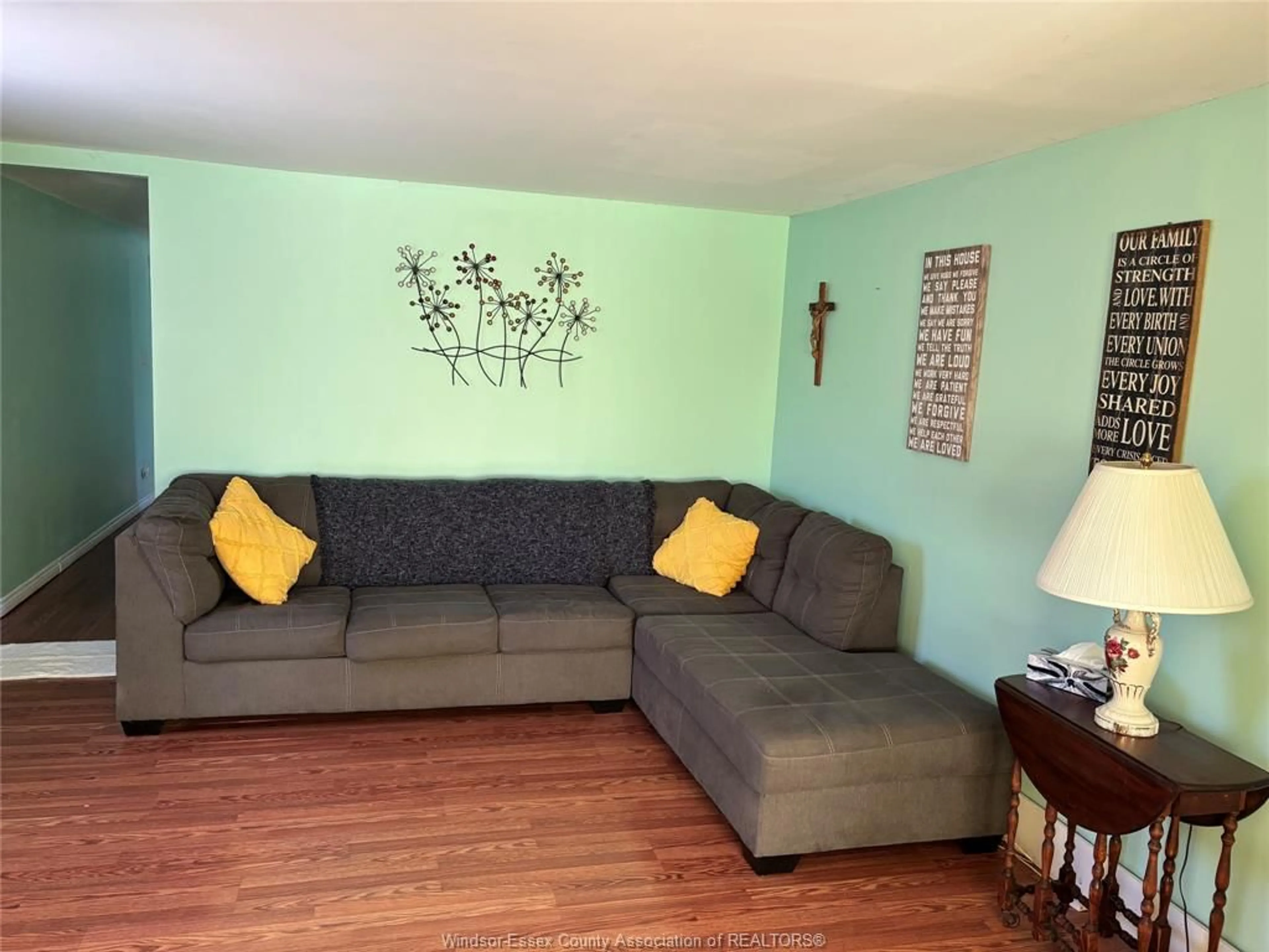 Living room with furniture, wood/laminate floor for 386 NORTH MALDEN, Essex Ontario N8M 2V3
