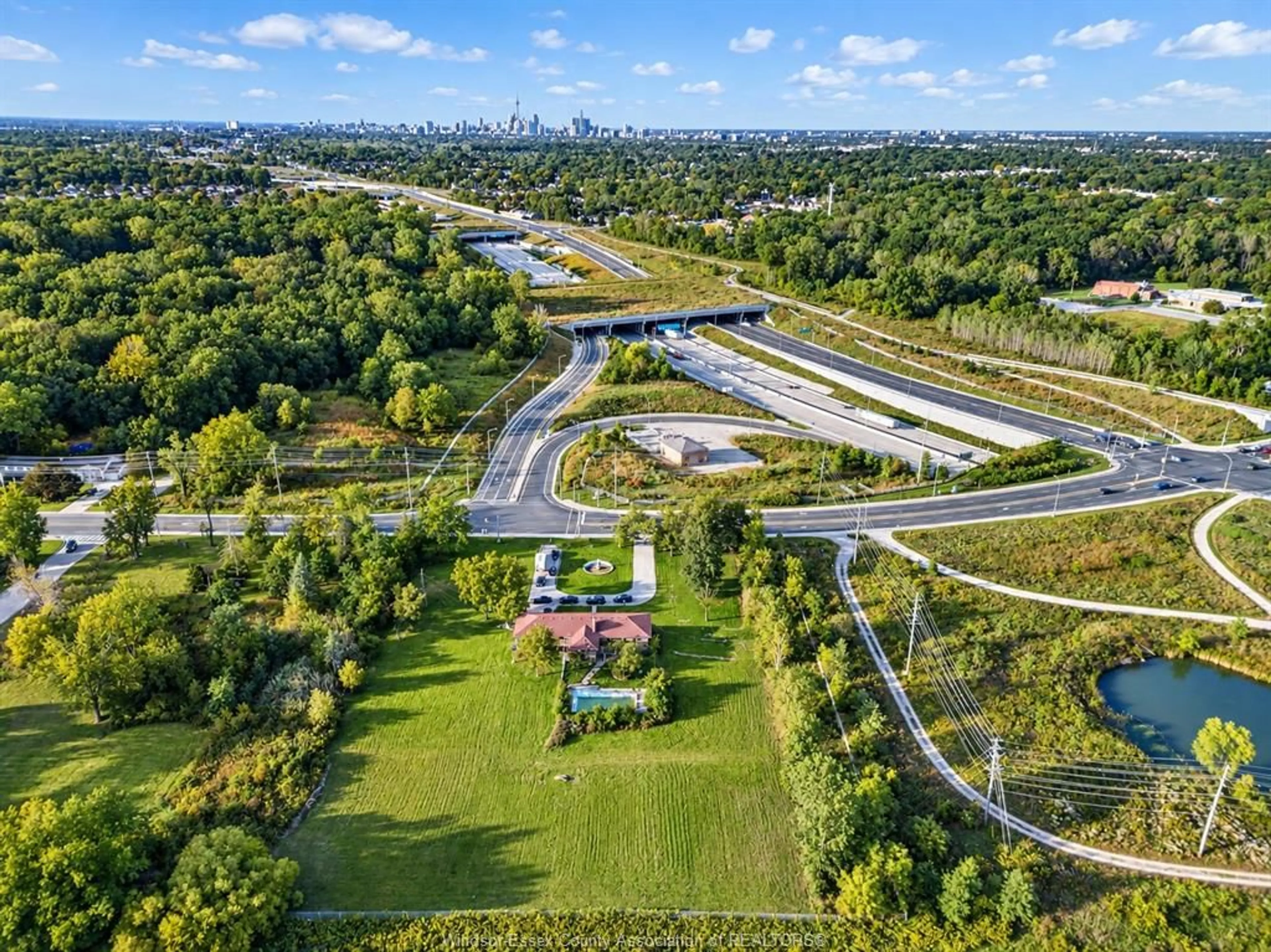 A pic from outside/outdoor area/front of a property/back of a property/a pic from drone, street for 2775 TODD Lane, LaSalle Ontario N9H 1K9