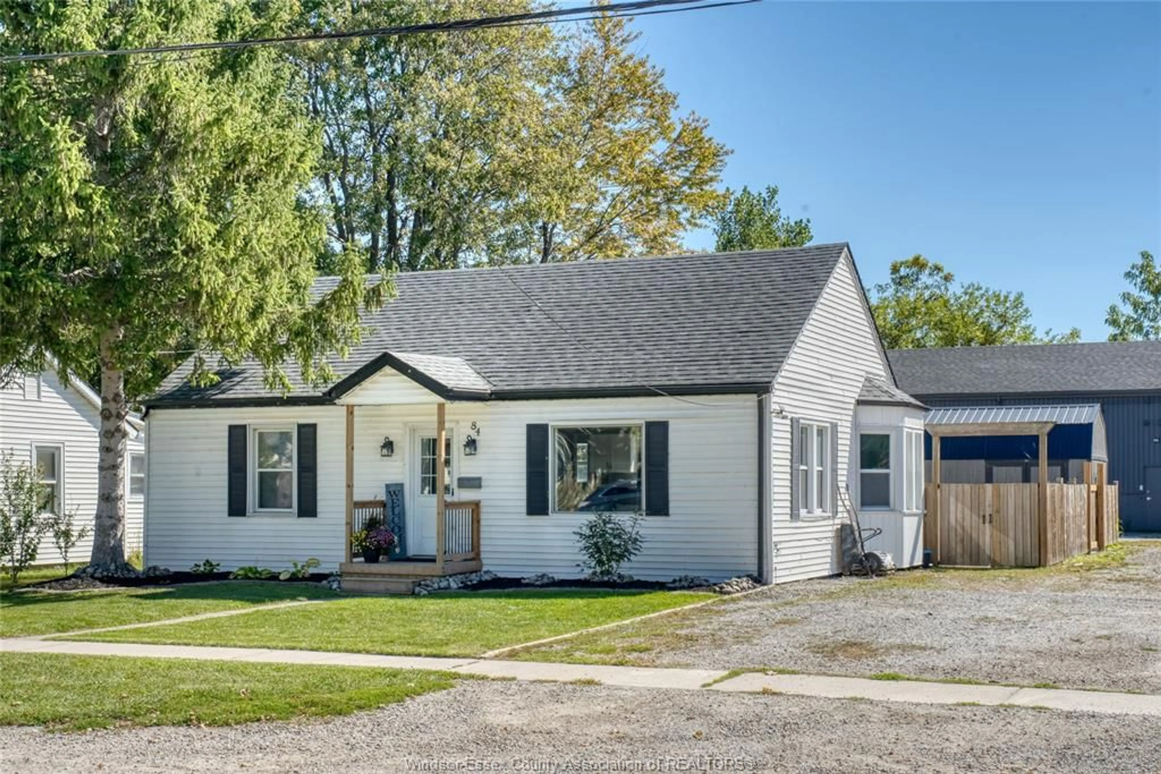 Home with vinyl exterior material, street for 84 CAMERON, Essex Ontario N8M 2L5